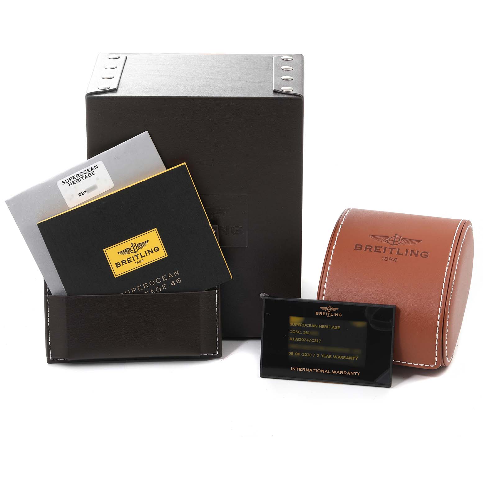 The image shows a Breitling Superocean A13320 Men's Stainless Steel Blue Dial A13320 Men's Stainless Steel Blue Dial watch box, warranty booklet, and a leather case with accessories, viewed from the front.