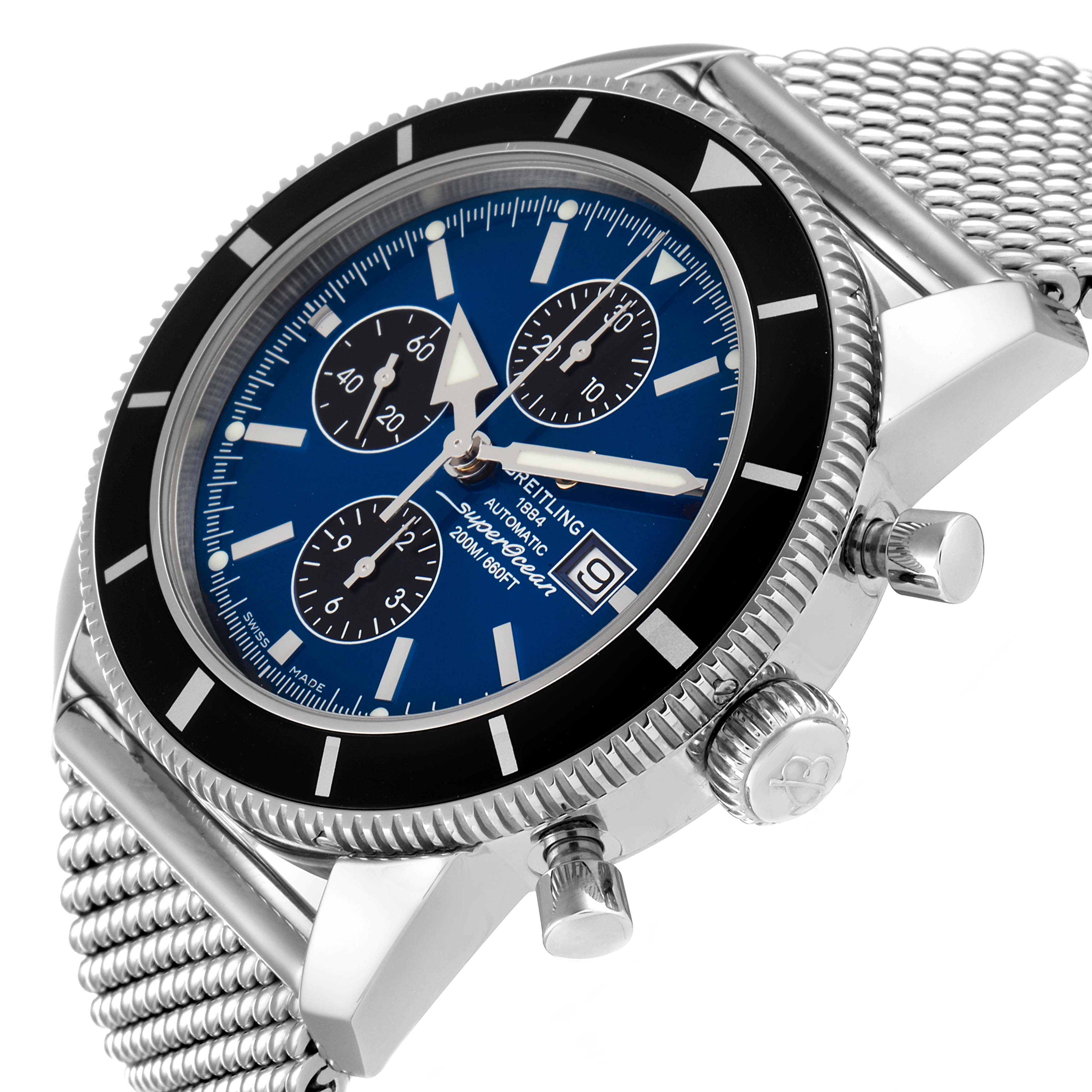 The Breitling Superocean A13320 Men's Stainless Steel Blue Dial A13320 Men's Stainless Steel Blue Dial watch is shown at a slight angle, featuring its blue dial, black bezel, mesh band, and side buttons/crown.