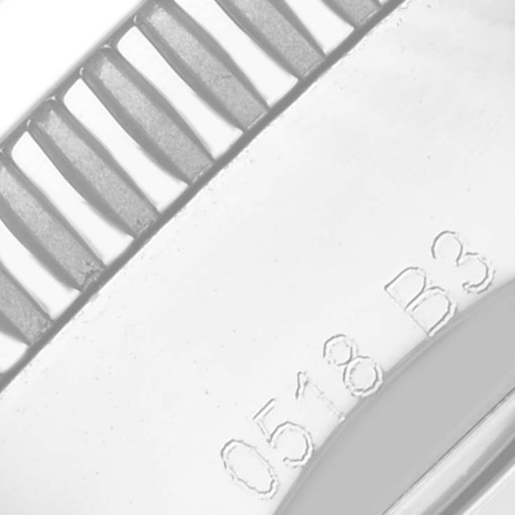 The image shows a close-up of the bezel and side engravings of the Breitling Superocean A1331233/Q616 Men's Stainless Steel Brown Dial A1331233/Q616 Men's Stainless Steel Brown Dial watch.