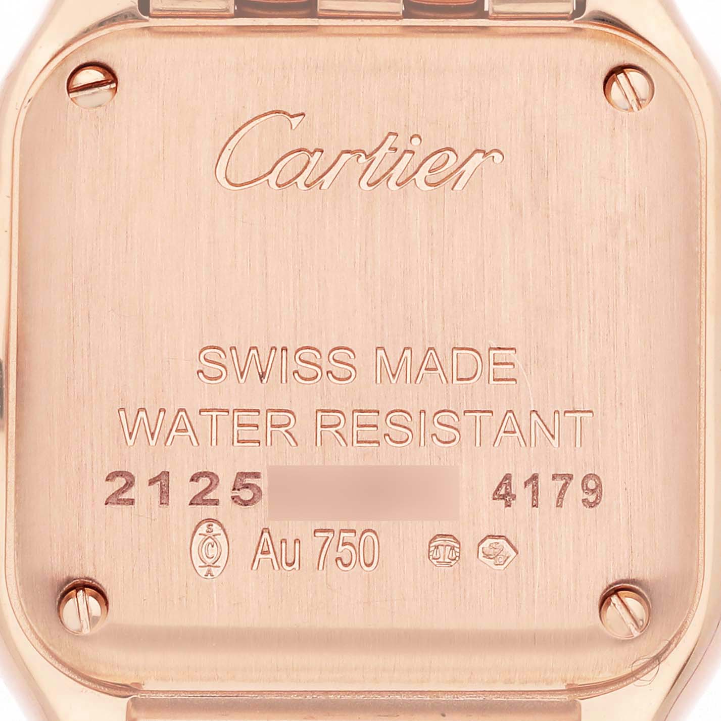 The image shows the back case of a Cartier Panthere WJPN0008 Women
s Rose Gold Silver Dial WJPN0008 Women
s Rose Gold Silver Dial watch, highlighting engravings and screws.