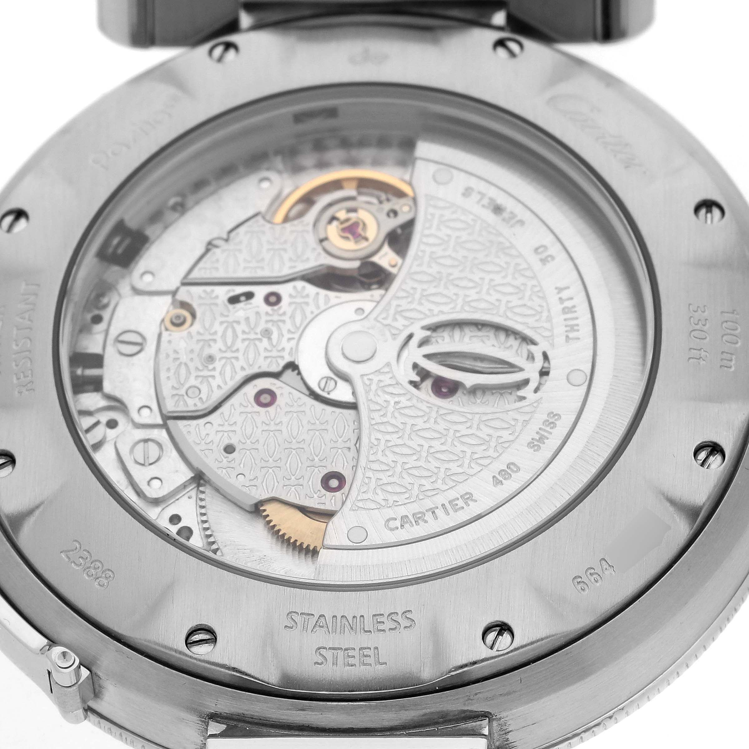 The image shows the back view of the Cartier Pasha W31037H3 Men's Stainless Steel Silver Dial W31037H3 Men's Stainless Steel Silver Dial watch, highlighting its mechanical movement and stainless steel case detailing.