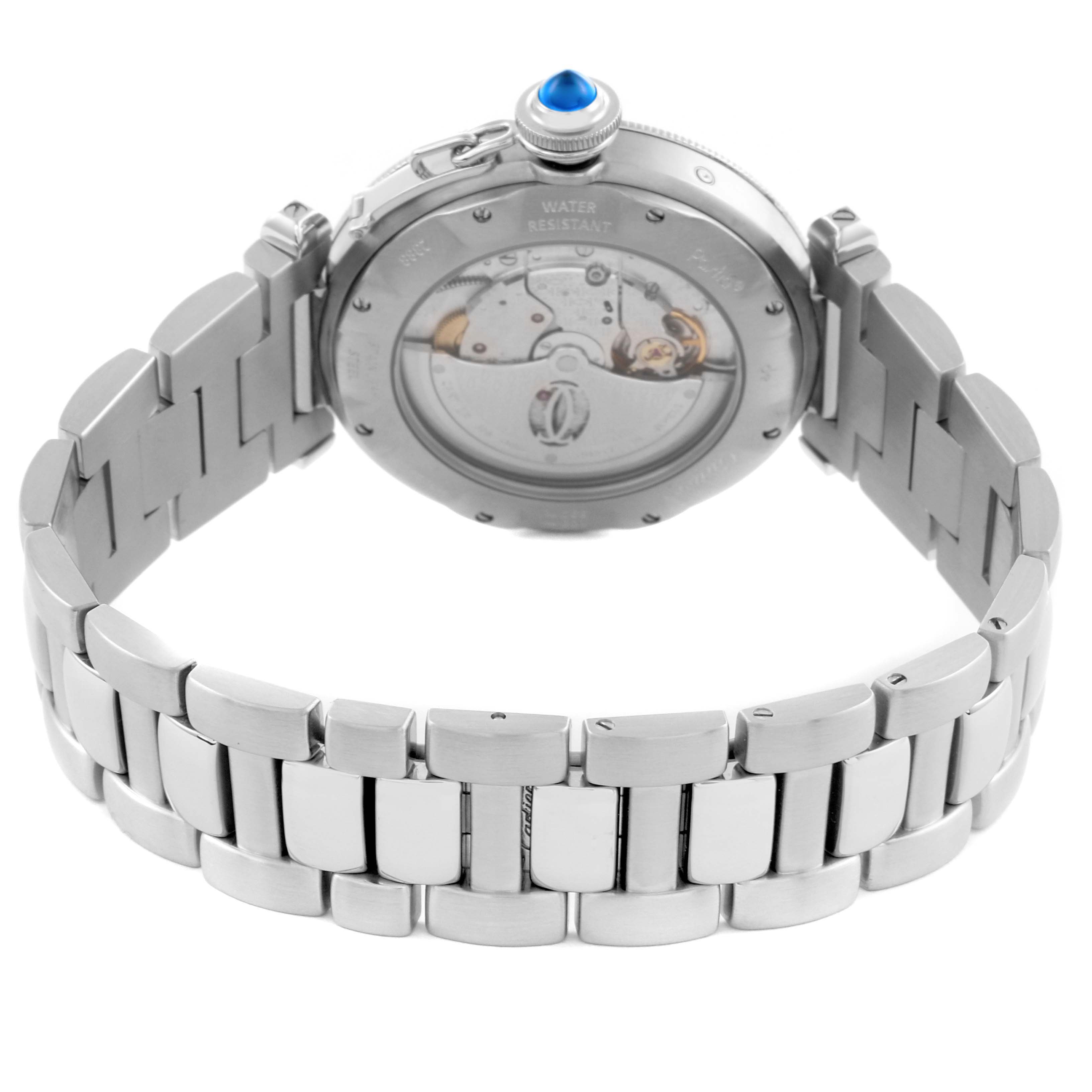 The image shows the back view of a Cartier Pasha W31037H3 Men's Stainless Steel Silver Dial W31037H3 Men's Stainless Steel Silver Dial watch, highlighting its movement and metal bracelet.