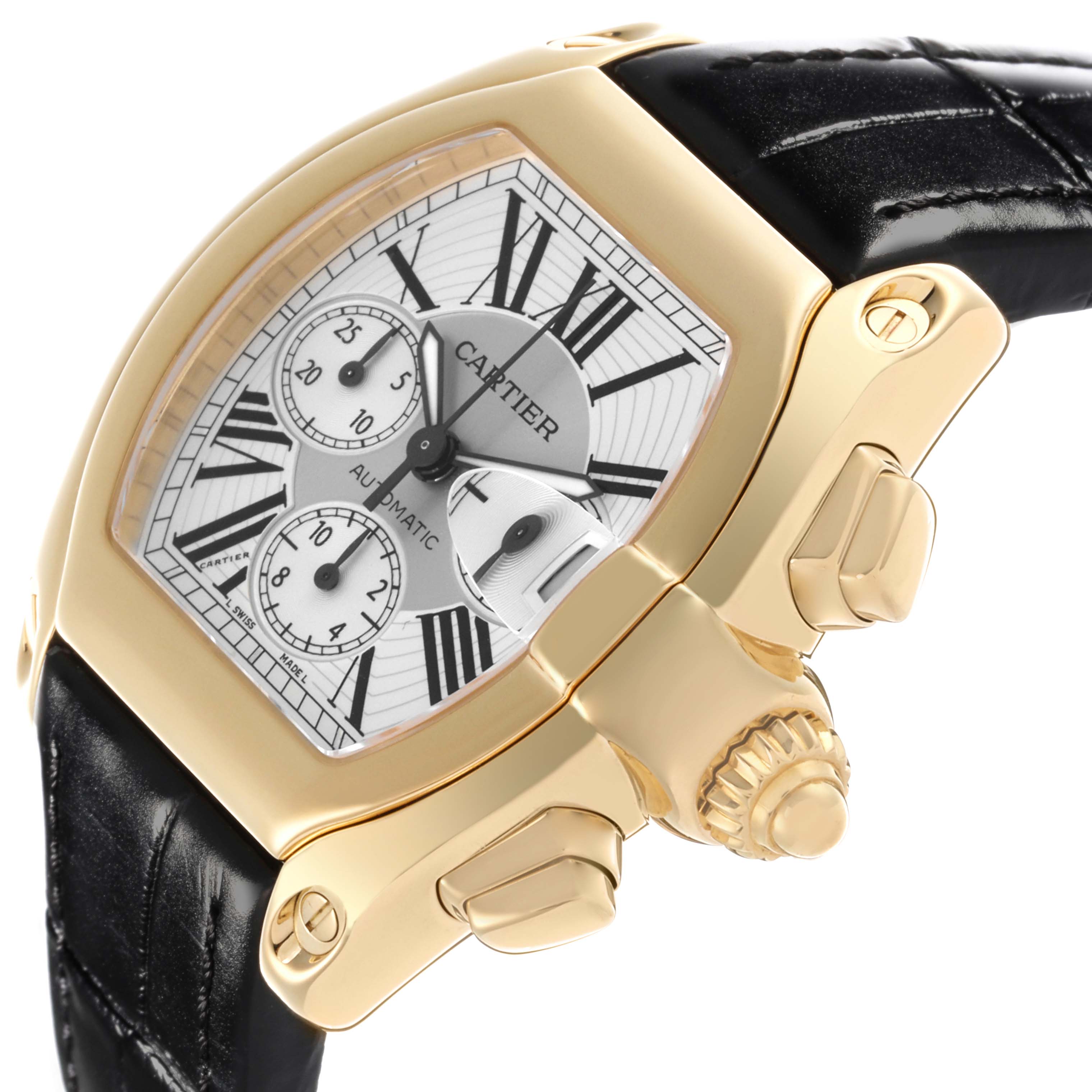 The Cartier Roadster W62021Y3 Men's Yellow Gold Silver Dial W62021Y3 Men's Yellow Gold Silver Dial watch is shown at an angle highlighting the dial, case, crown, and part of the strap.