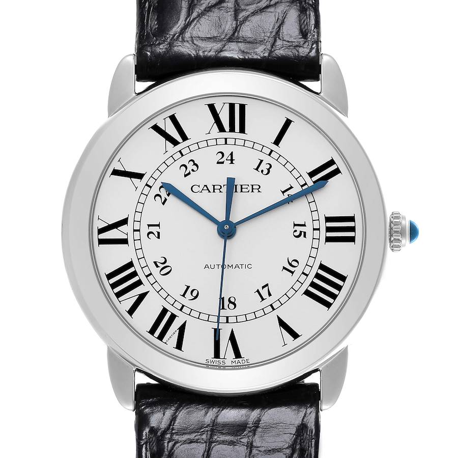 The Cartier Ronde watch is shown from a front angle, displaying its white dial, Roman numerals, and black leather strap.