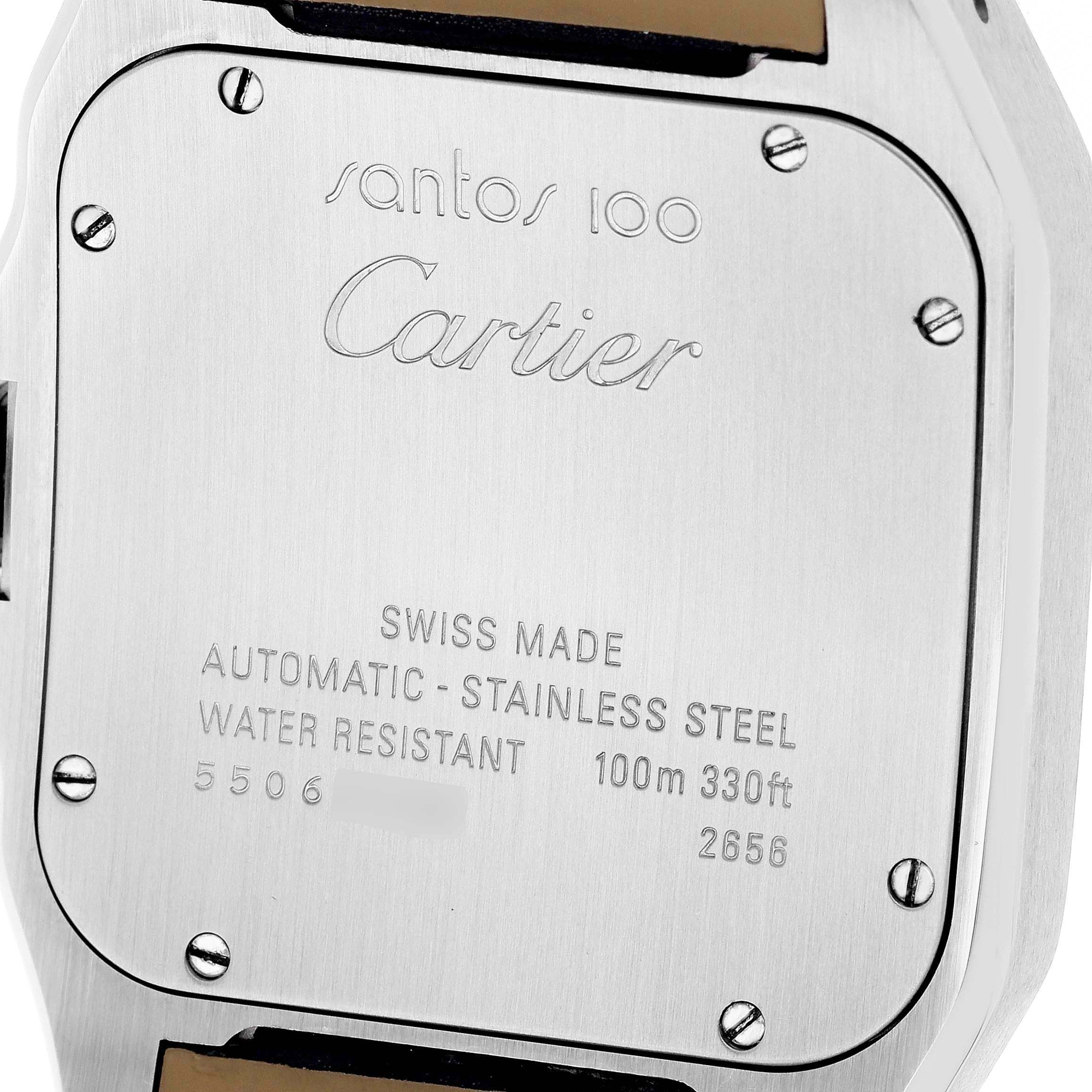 The image shows the back case of the Cartier Santos W20073X8 Men's Stainless Steel Silver Dial 100 watch, highlighting engraved brand details and specifications.
