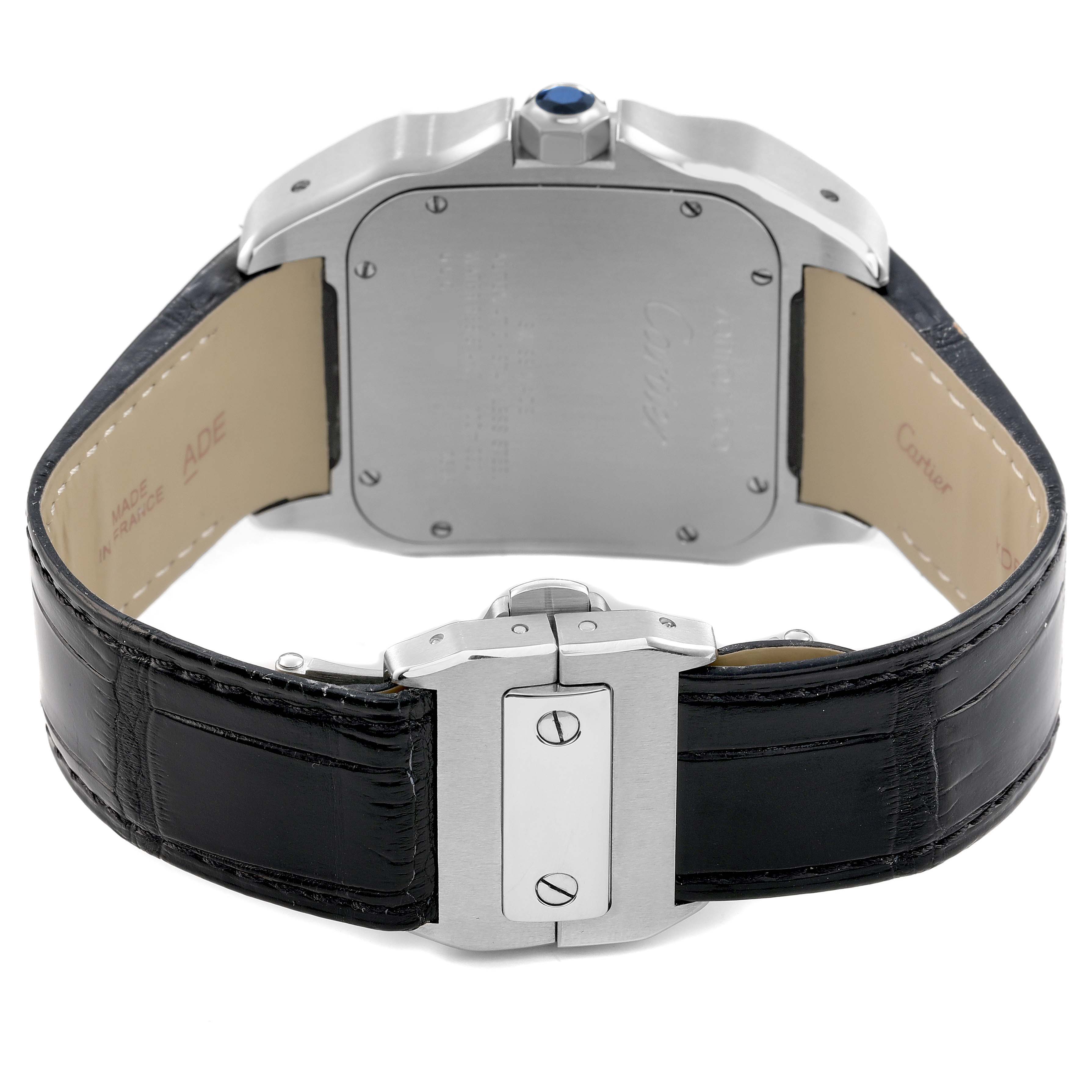 The image shows the back view of the Cartier Santos W20073X8 Men's Stainless Steel Silver Dial watch, highlighting the case back, leather strap, and clasp.
