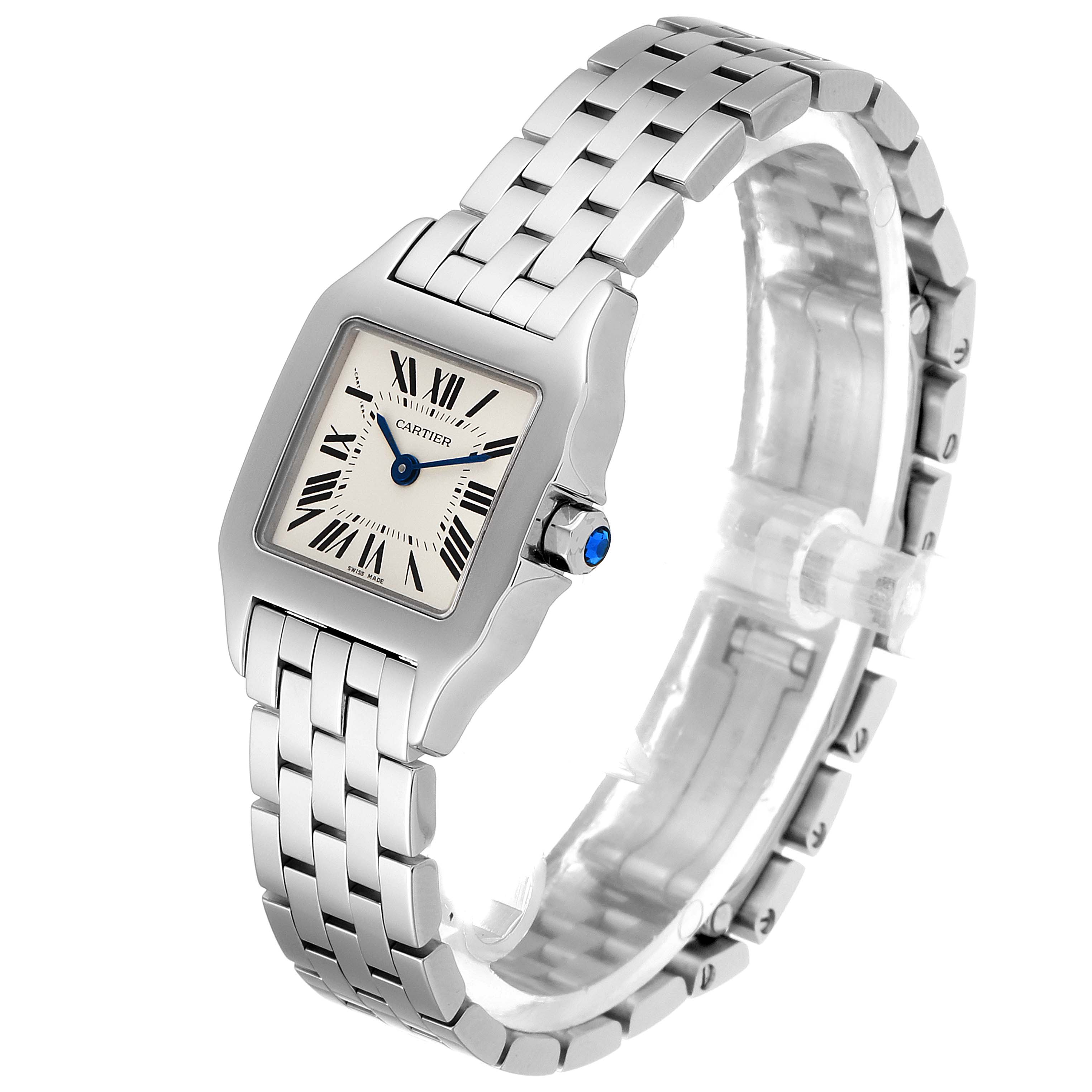 This is a side-angle view of the Santos Demoiselle watch by Cartier showing the face, bracelet, and crown.