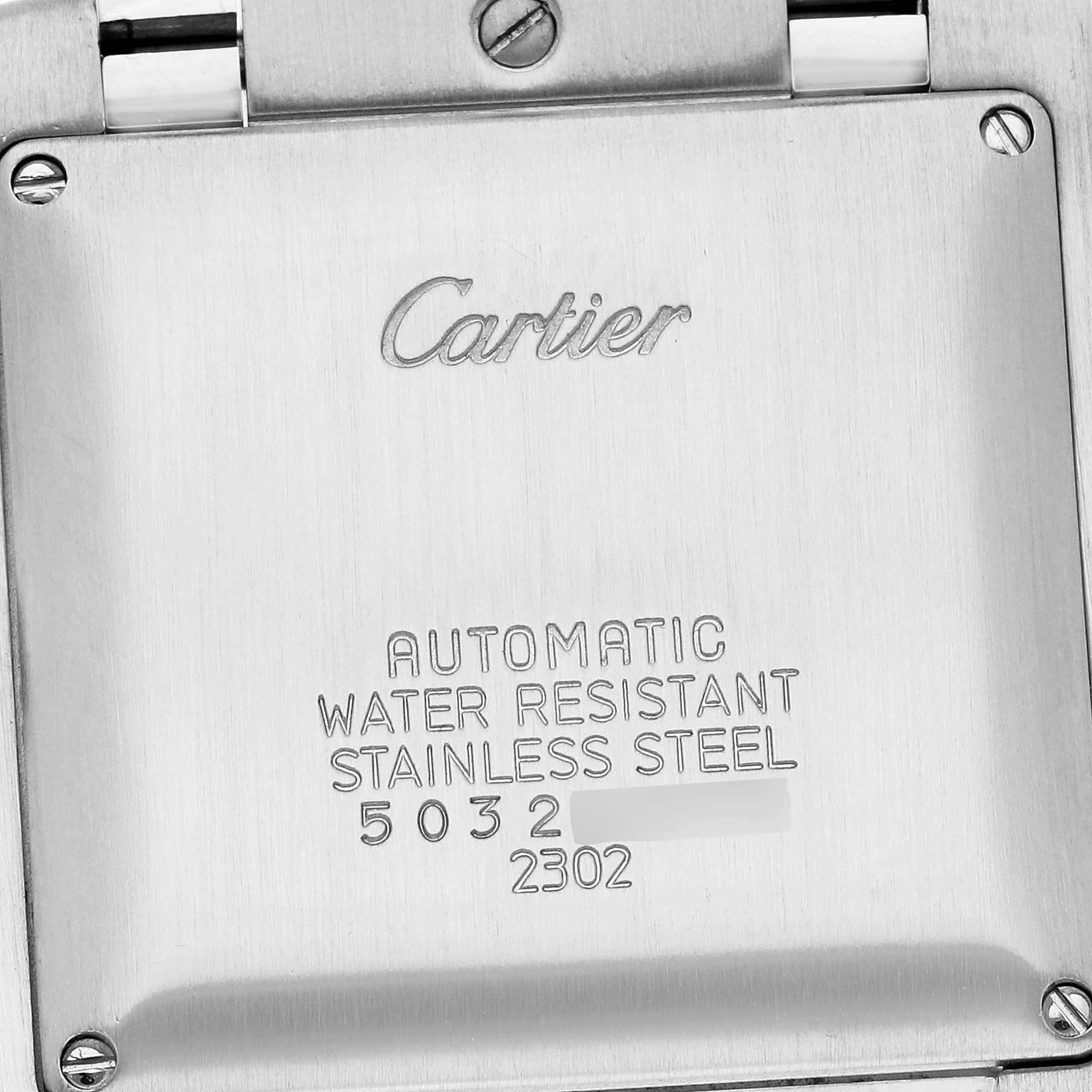 The image shows the back of a Cartier Tank Française watch, highlighting the engraved brand details and specifications.