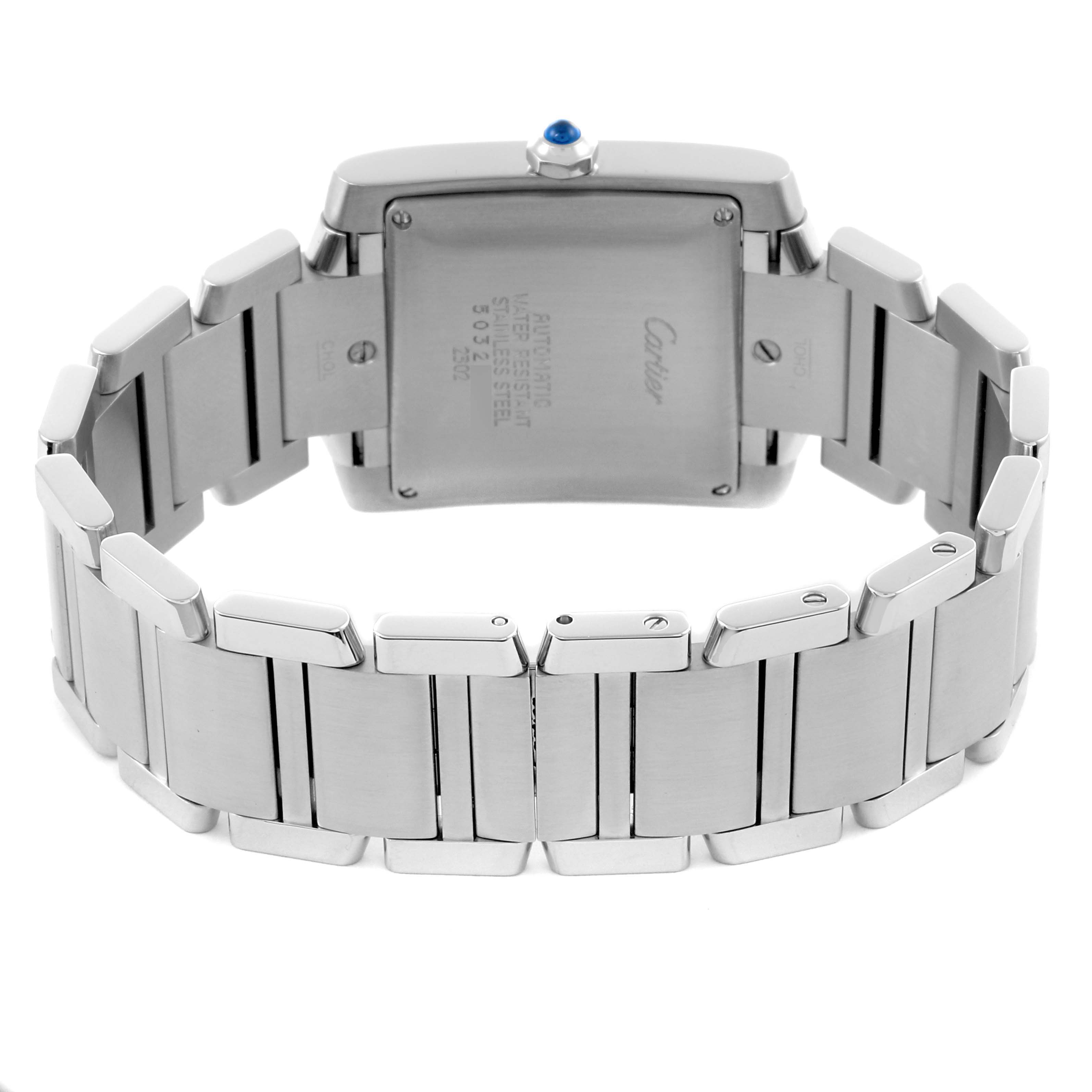 The Cartier Tank Française watch is shown from the back, highlighting the case back, bracelet, and blue cabochon crown.