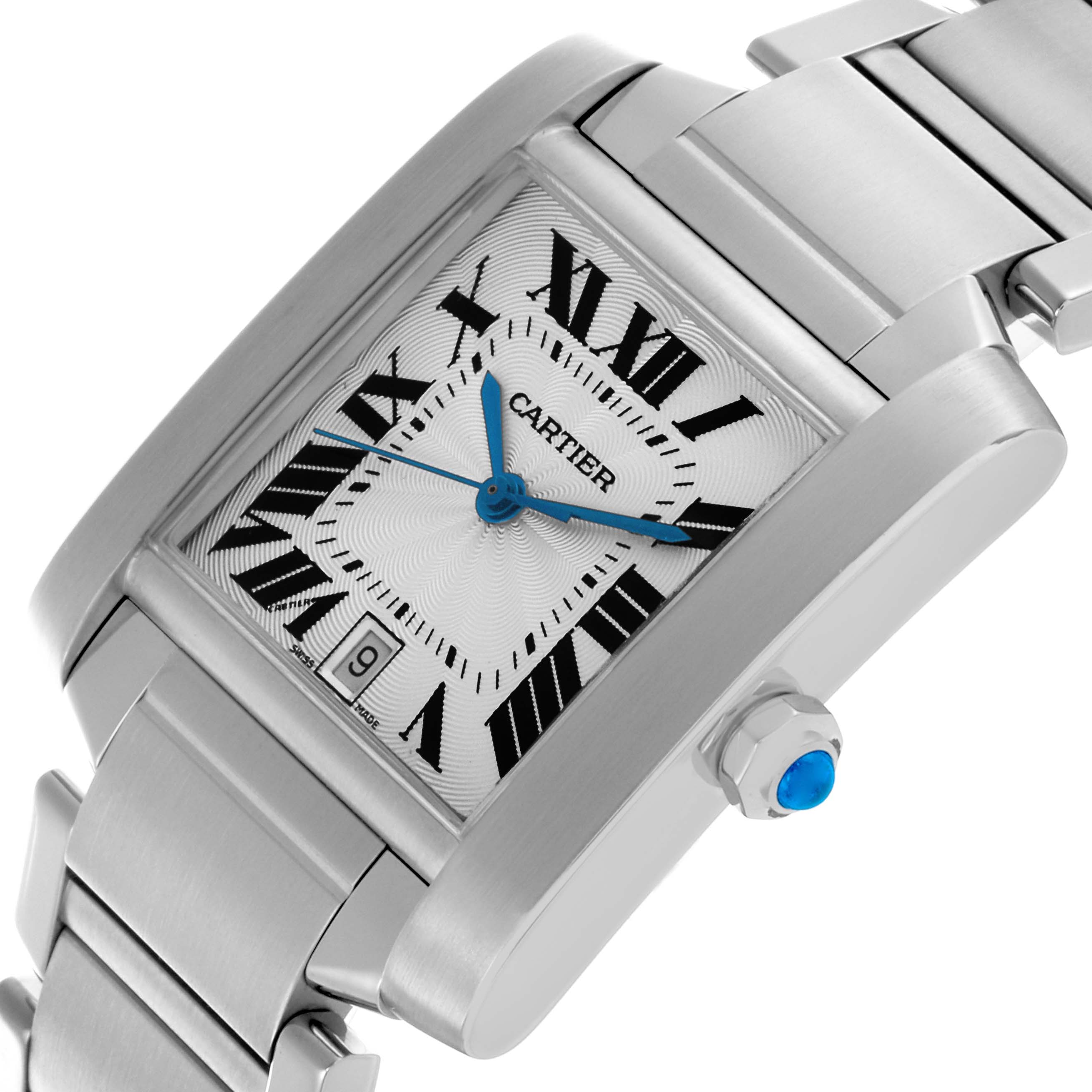 The Cartier Tank Française watch is shown at an angled view, highlighting the face, crown, and part of the metal bracelet.