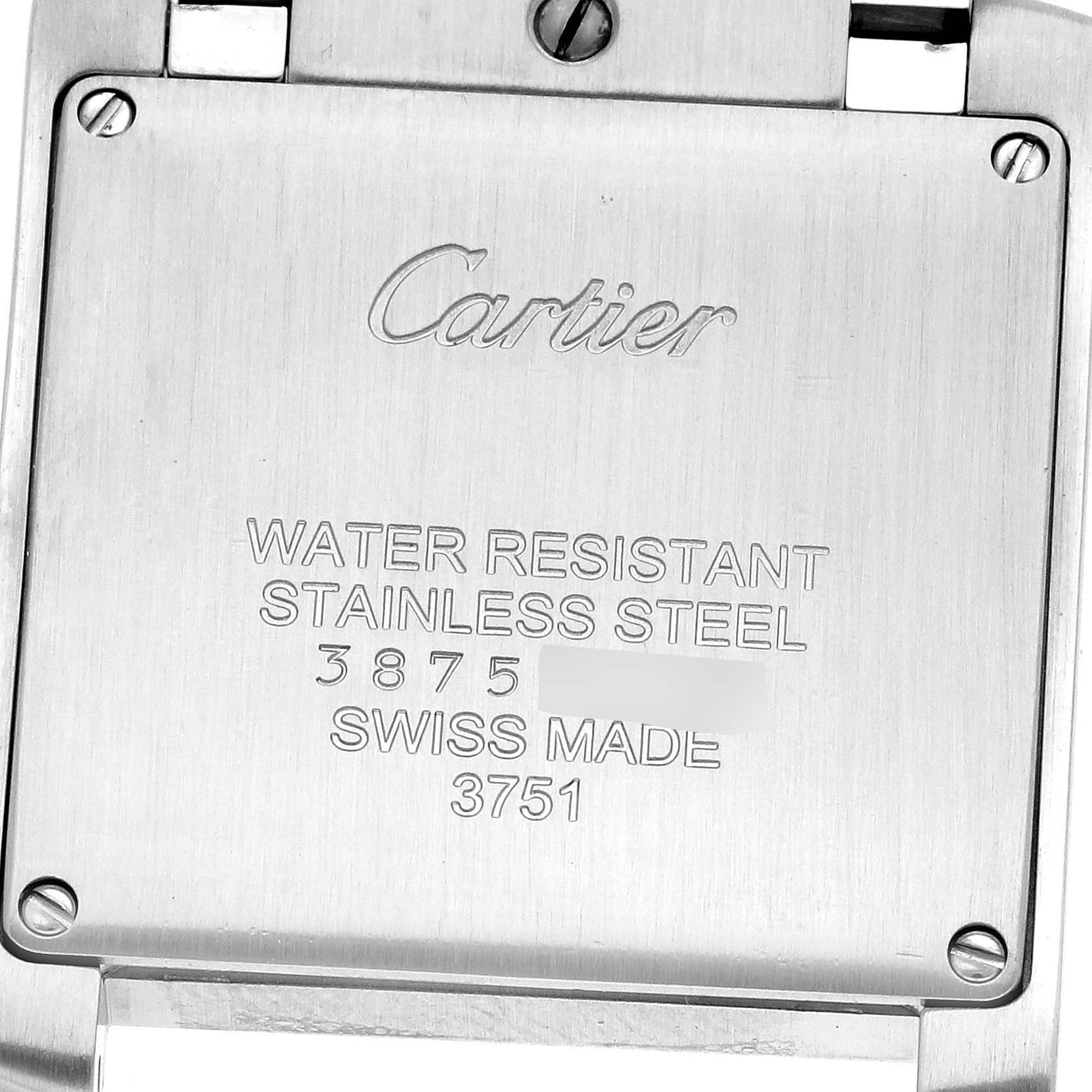 The image shows the back of the Cartier Tank Française watch, highlighting its stainless steel case and engravings.