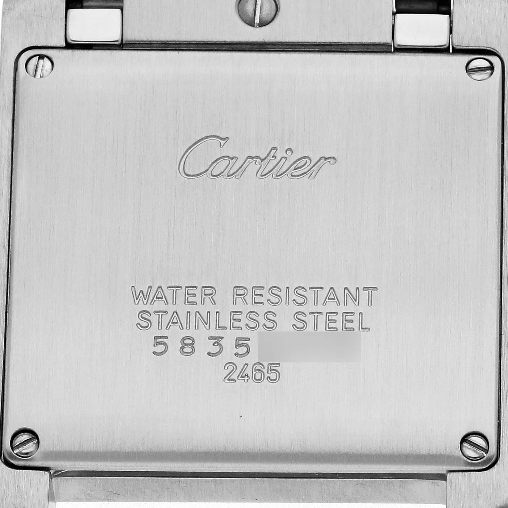 The image shows the back of the Cartier Tank Francaise W51012Q4 Women's Steel and Gold (two tone) Silver Dial W51012Q4 Women's Steel and Gold (two tone) Silver Dial watch, highlighting the stainless steel case and engraved details.