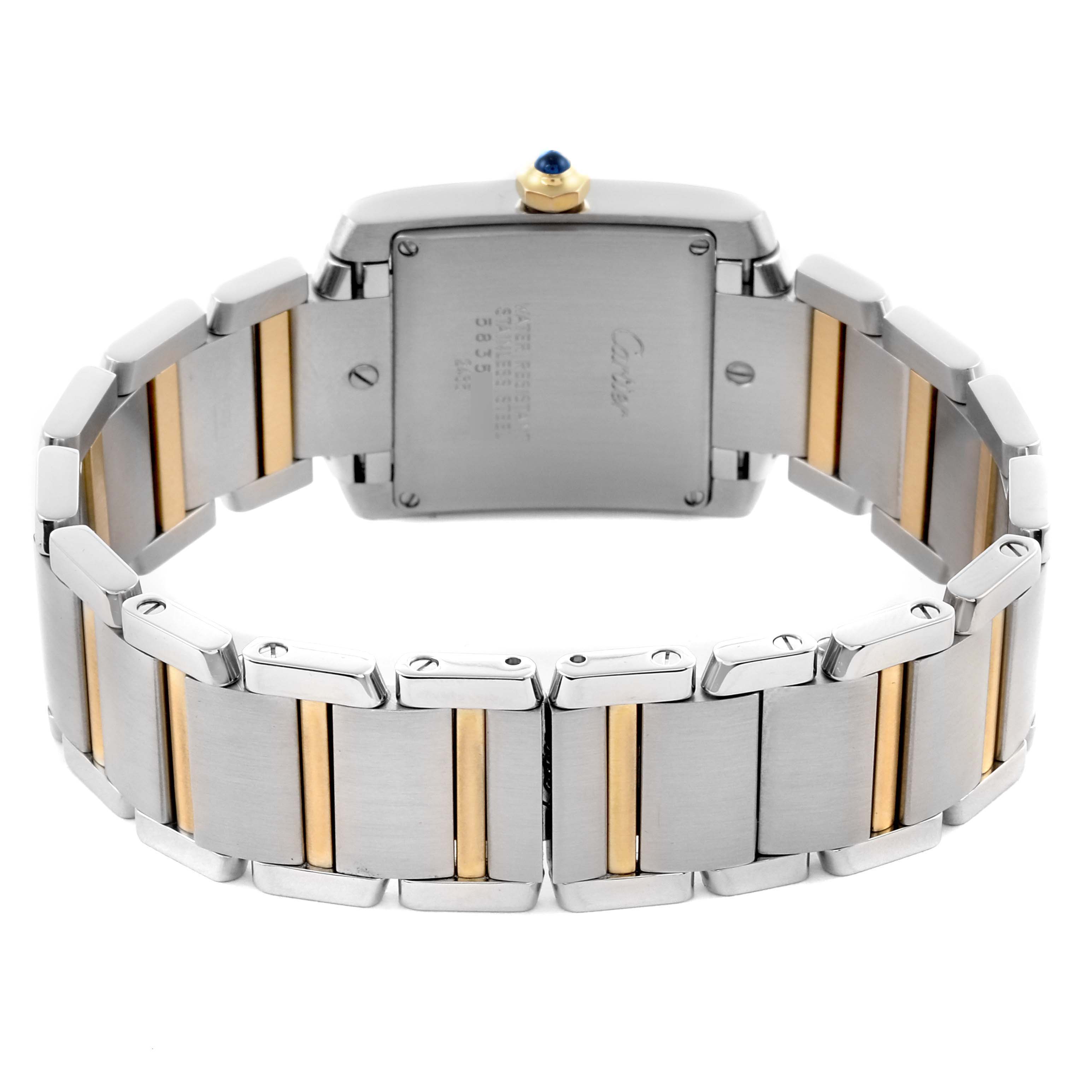 The image shows the back of a Cartier Tank Francaise W51012Q4 Women's Steel and Gold (two tone) Silver Dial W51012Q4 Women's Steel and Gold (two tone) Silver Dial watch, highlighting the case back and two-tone bracelet.