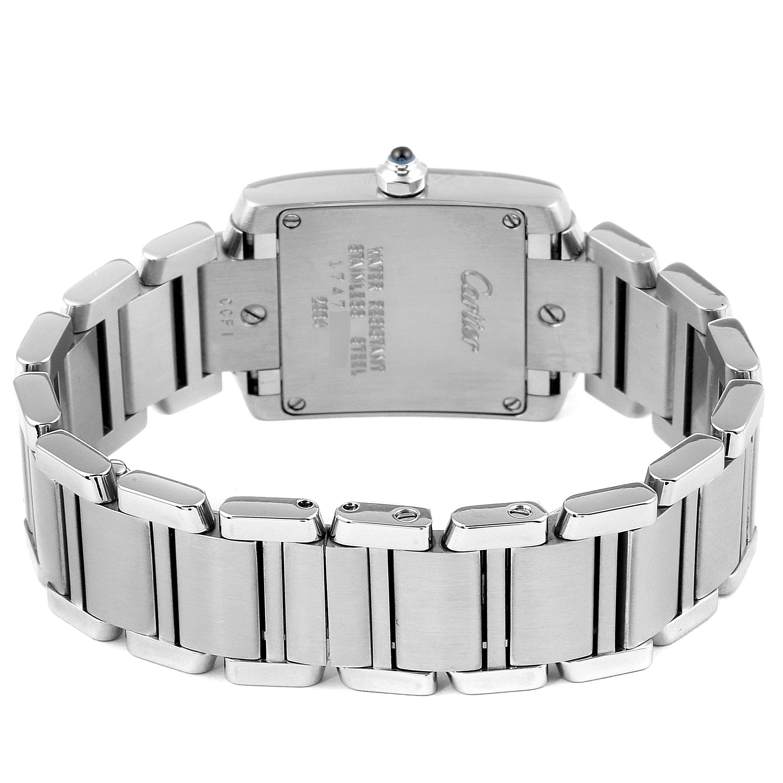 This image shows the back view of the Cartier Tank Française model, highlighting its stainless steel bracelet and case back.