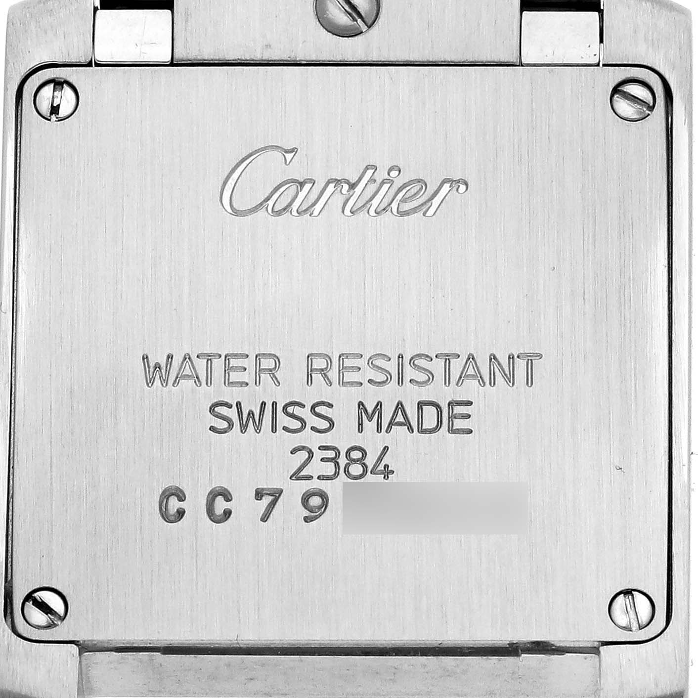 The image shows the back of a Cartier Tank Française watch, highlighting the engraved brand and model details.