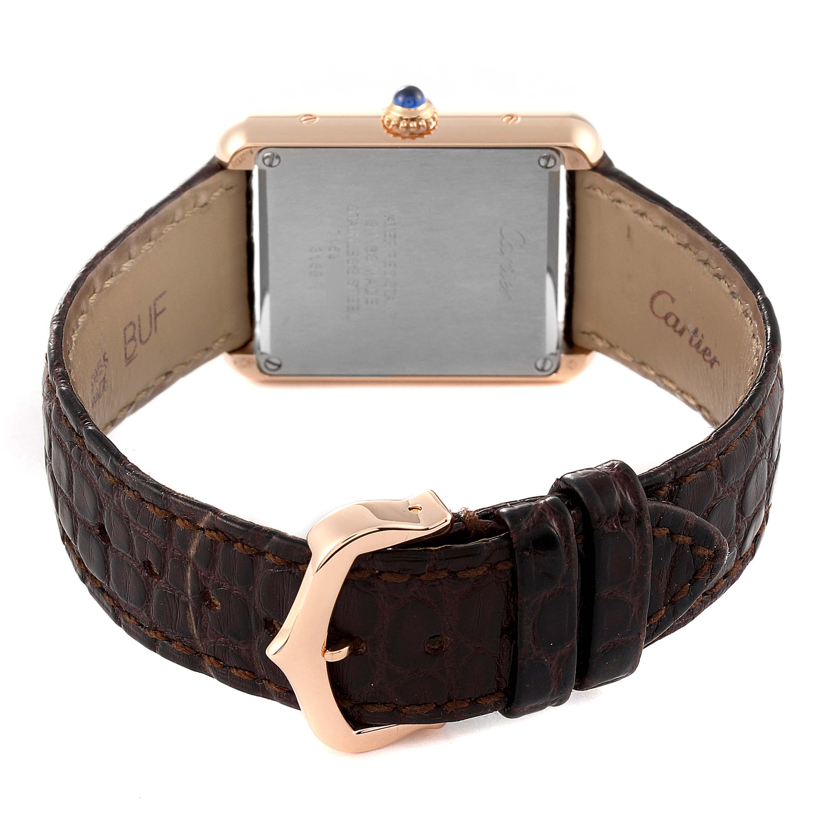 This image shows the back of a Tank Solo watch by Cartier, highlighting the leather strap and clasp.