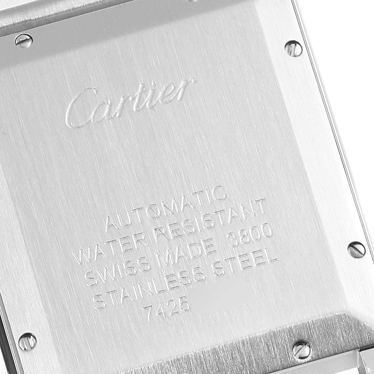 The image shows a close-up of the back of the Cartier Tank Solo W5200028 Men's Stainless Steel Silver Dial W5200028 Men's Stainless Steel Silver Dial watch, highlighting details like the brand's engraved name and specifications.