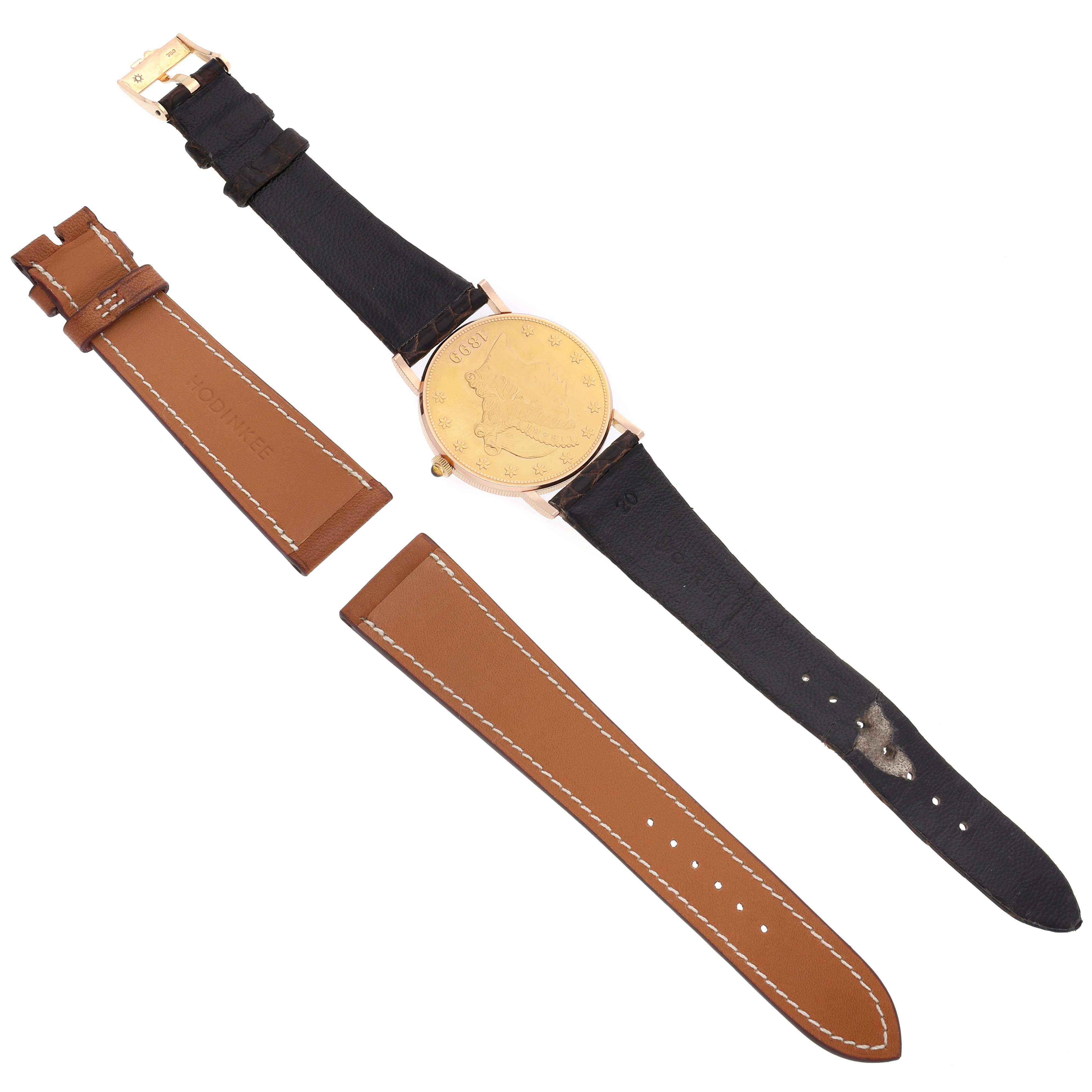 The image shows a Corum Coin Watch 4414556 Men's Yellow Gold Champagne Dial 4414556 Men's Yellow Gold Champagne Dial from a top view with a gold coin face and two extra brown leather straps.