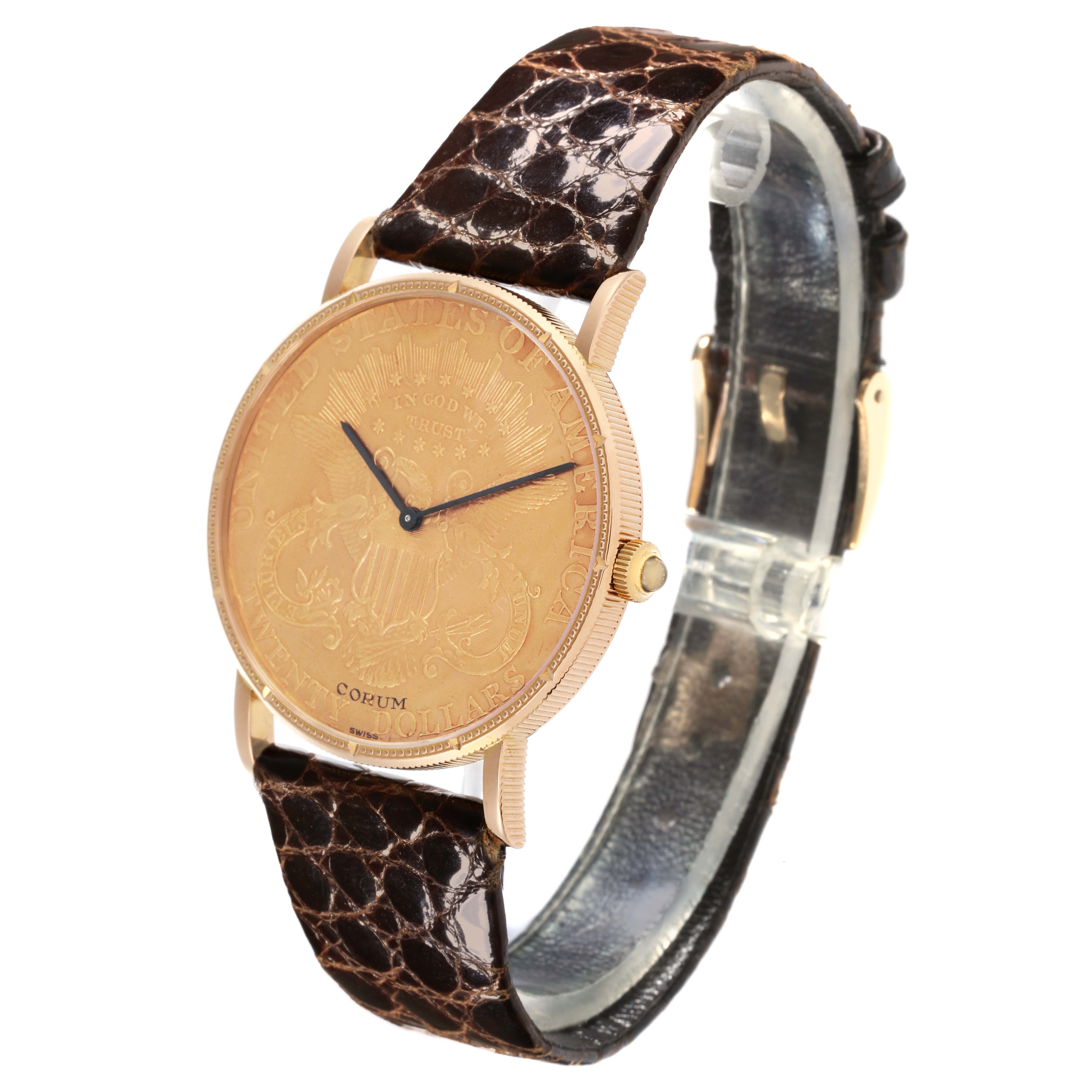 The Corum Coin Watch 4414556 Men's Yellow Gold Champagne Dial 4414556 Men's Yellow Gold Champagne Dial is shown at a three-quarter angle, highlighting the gold face, side profile, and brown leather strap.