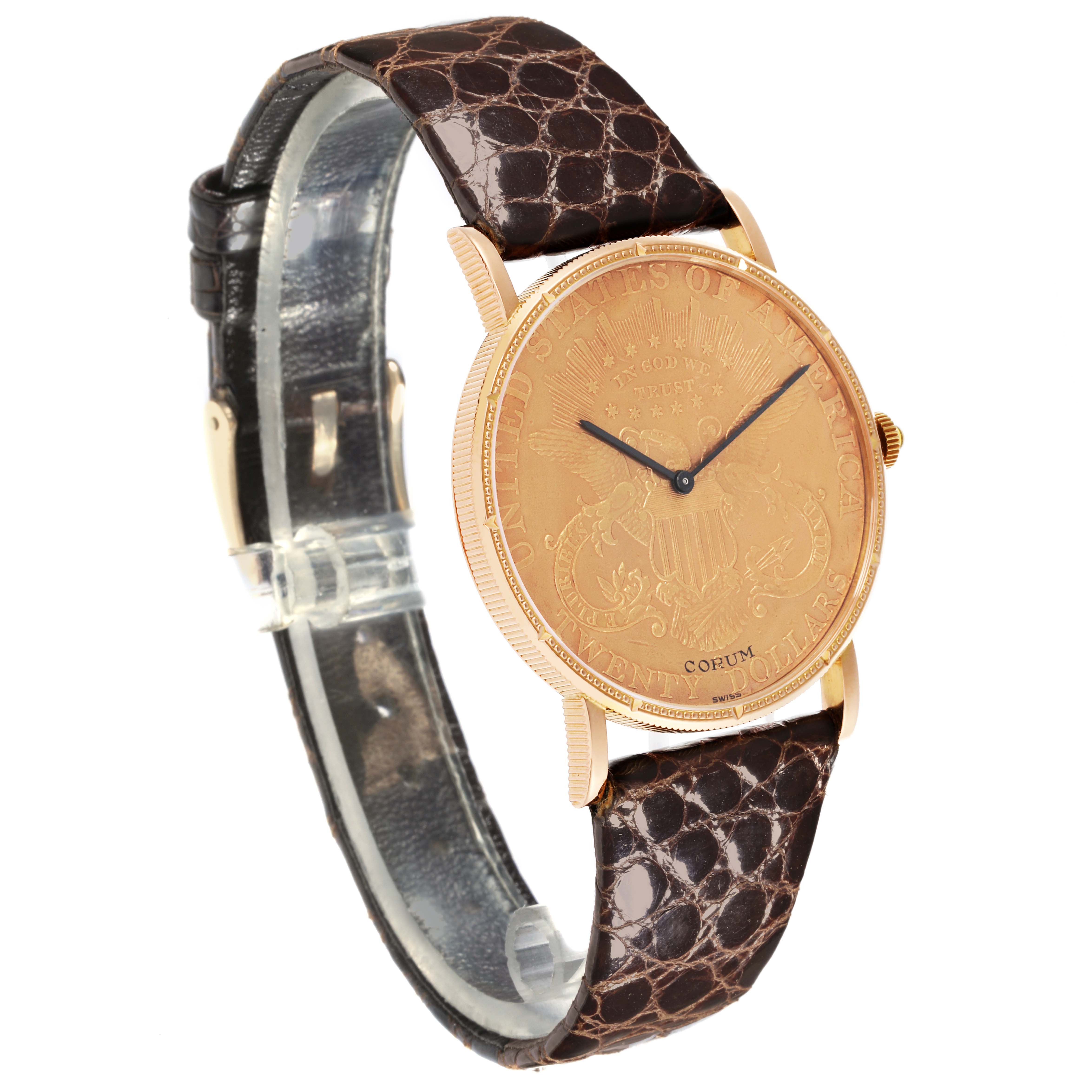 The Corum Coin Watch 4414556 Men's Yellow Gold Champagne Dial 4414556 Men's Yellow Gold Champagne Dial model is shown at a slight angle, displaying the watch face, bezel, and leather strap.