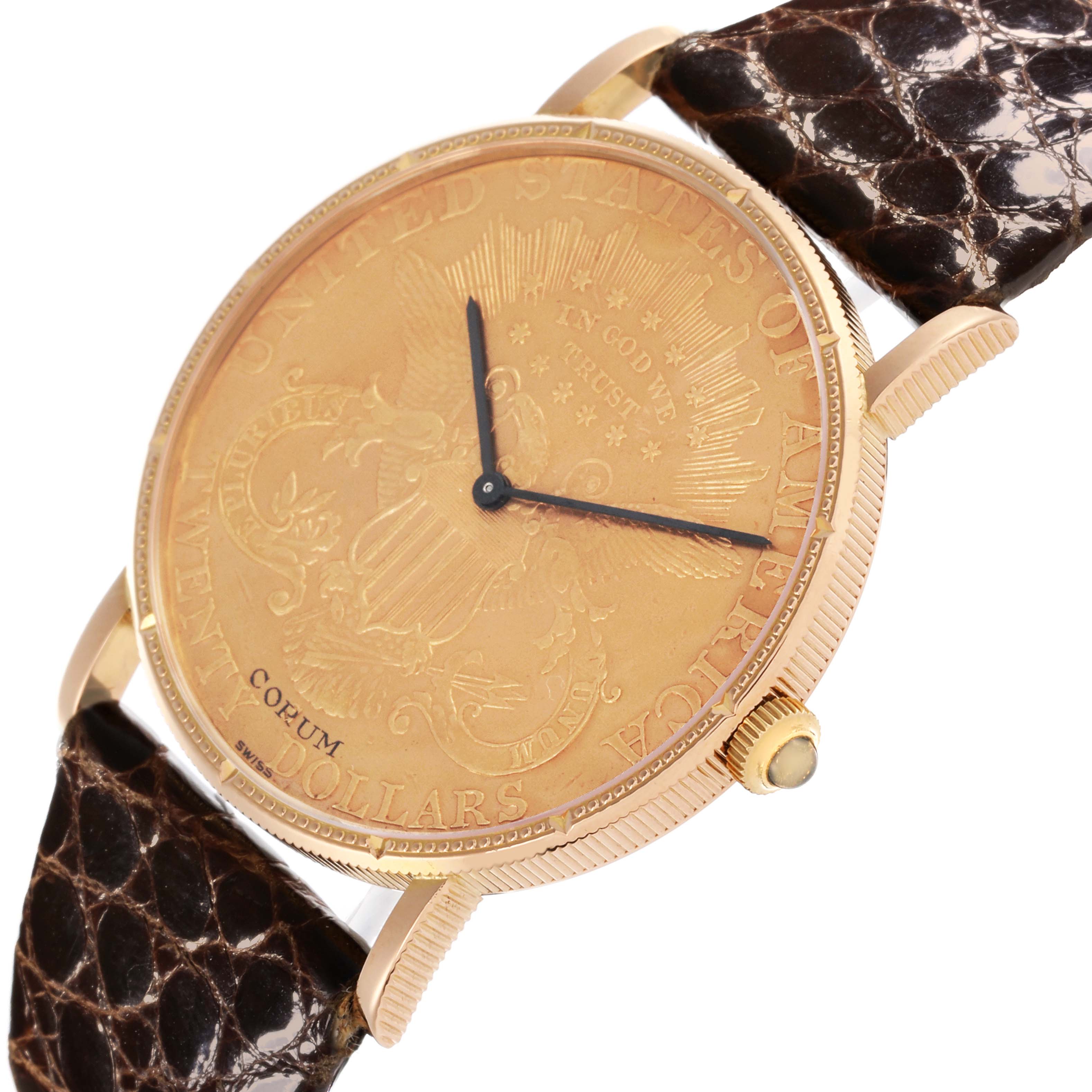 The Corum Coin Watch 4414556 Men's Yellow Gold Champagne Dial 4414556 Men's Yellow Gold Champagne Dial model is shown at a slight angle, highlighting the gold coin face, crown, lugs, and textured brown strap.