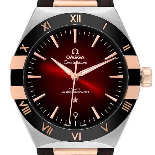 The Omega Constellation watch is shown from the front, highlighting the dial, bezel, and crown.