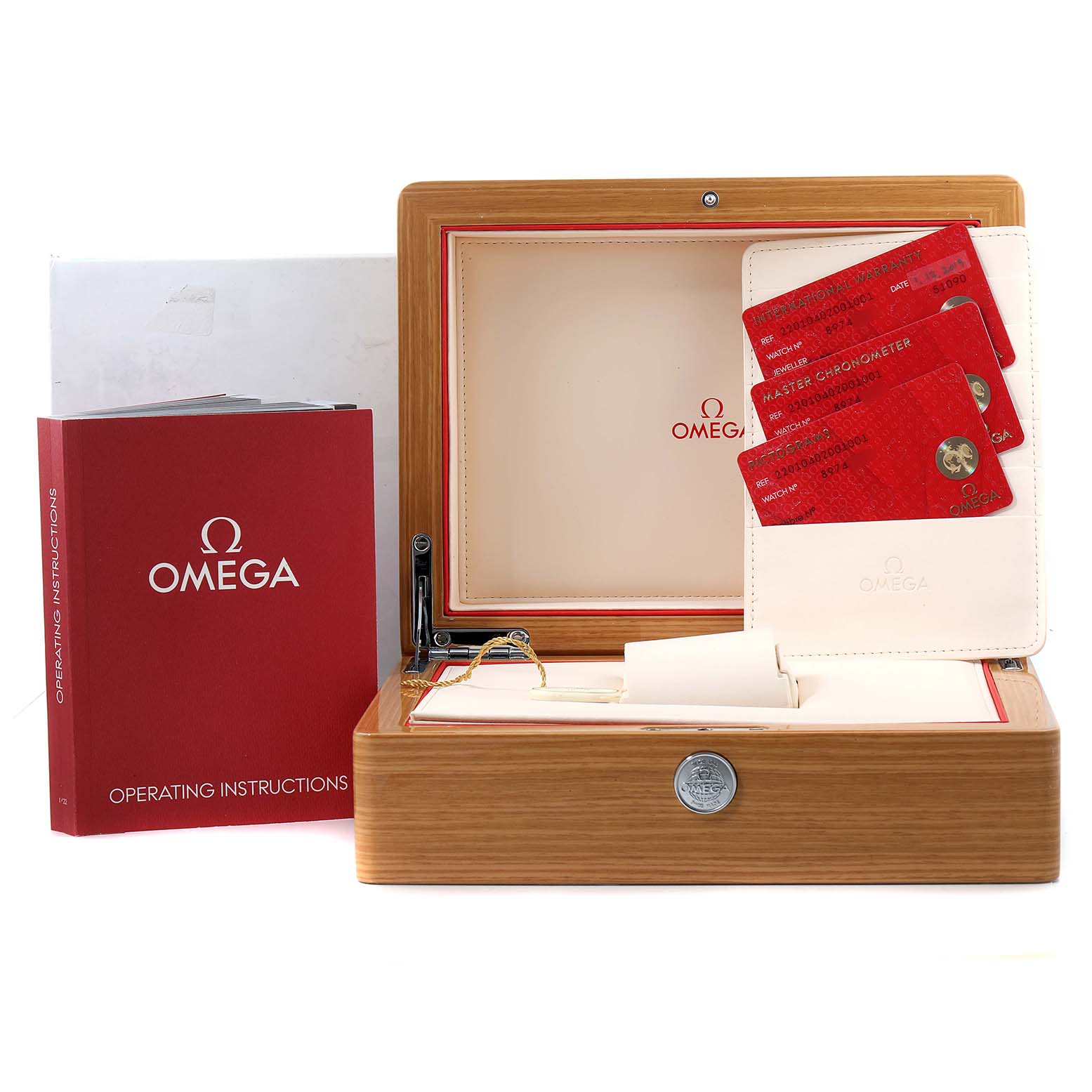 The image shows the packaging of an Omega Aqua Terra 220.10.40.20.01.001 Men's Stainless Steel Black Dial 220.10.40.20.01.001 Men's Stainless Steel Black Dial watch, including its box, operating instructions, and certification cards.