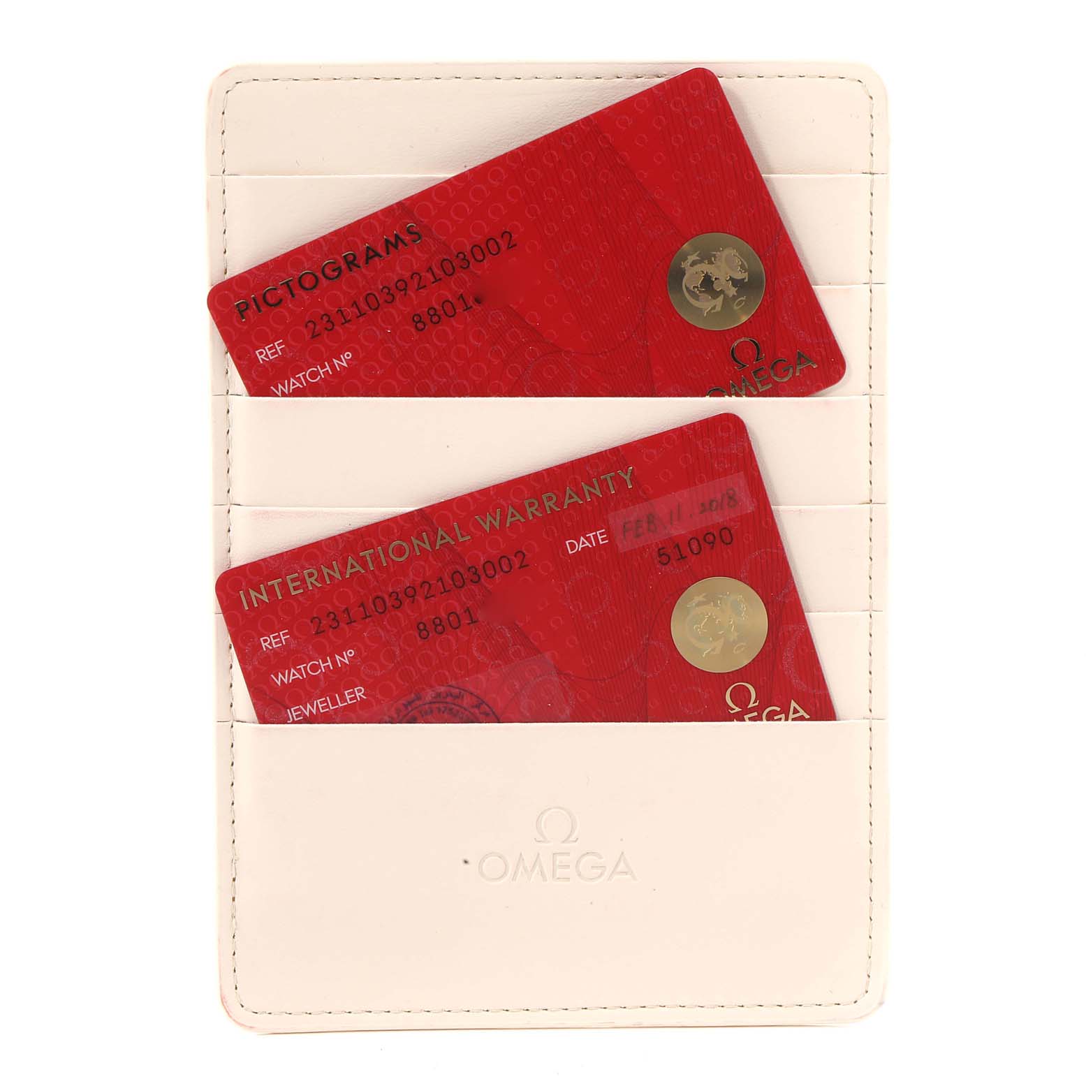 The image shows warranty cards and a pictogram card in a white Omega cardholder for the Aqua Terra model by Omega.
