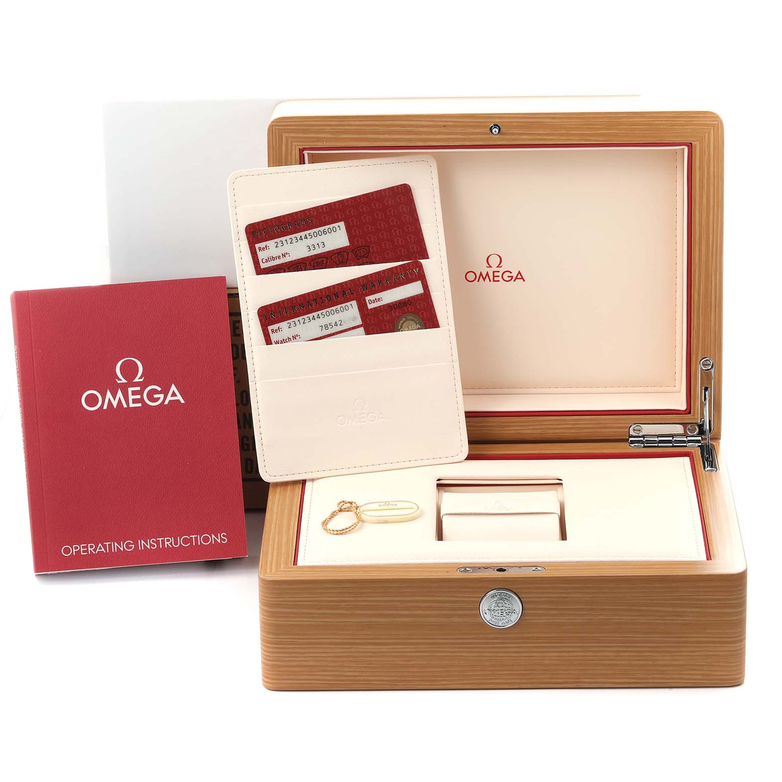 The image shows an Omega Aqua Terra 231.23.44.50.06.001 Men's Steel and Gold (two tone) Grey Dial 231.23.44.50.06.001 Men's Steel and Gold (two tone) Grey Dial watch box, warranty cards, and operating instructions from a front angle.