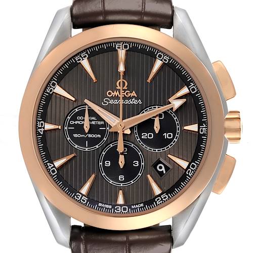 The Omega Aqua Terra watch is shown from the front, displaying its dial, hands, and bezel, with a brown leather strap visible.