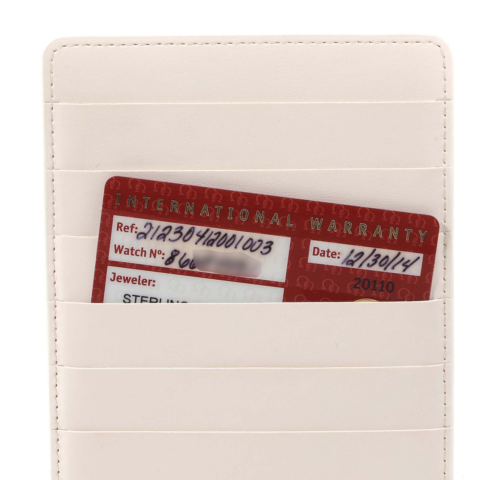 The image shows an Omega Seamaster 212.30.41.20.01.003 Men
s Stainless Steel Black Dial 212.30.41.20.01.003 Men
s Stainless Steel Black Dial international warranty card in a white cardholder.