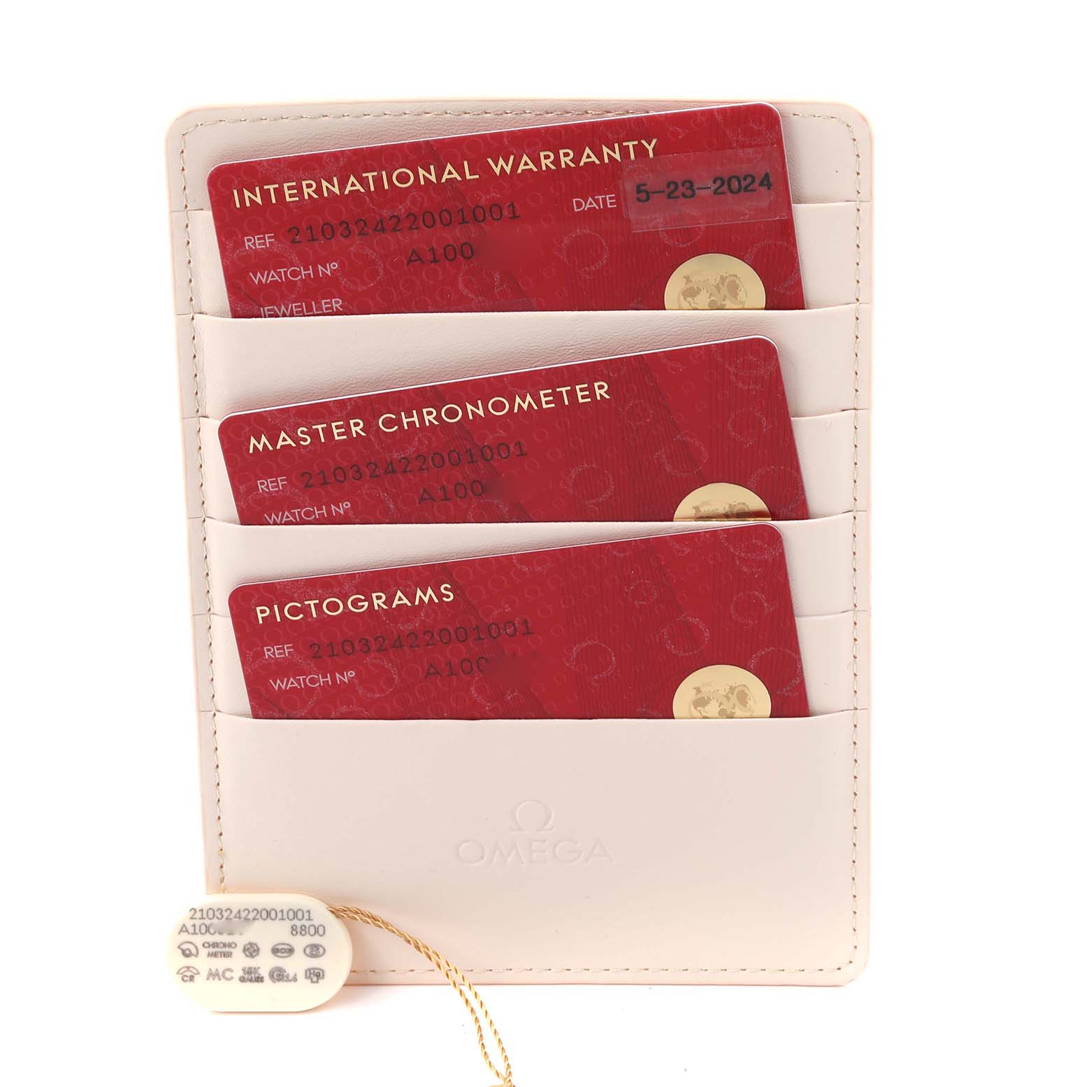 The image shows Omega Seamaster 210.32.42.20.01.001 Men's Stainless Steel Black Dial 210.32.42.20.01.001 Men's Stainless Steel Black Dial warranty, master chronometer, and pictogram cards in a holder, along with a hang tag.