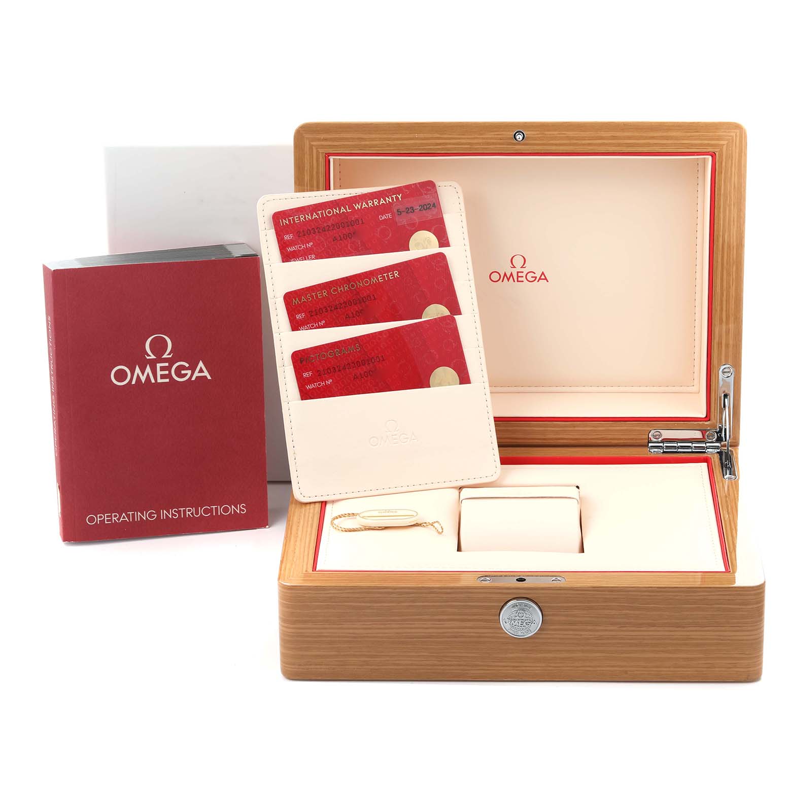 The image shows the packaging and accessories of the Omega Seamaster 210.32.42.20.01.001 Men's Stainless Steel Black Dial 210.32.42.20.01.001 Men's Stainless Steel Black Dial, including a box, warranty cards, and an instruction booklet.