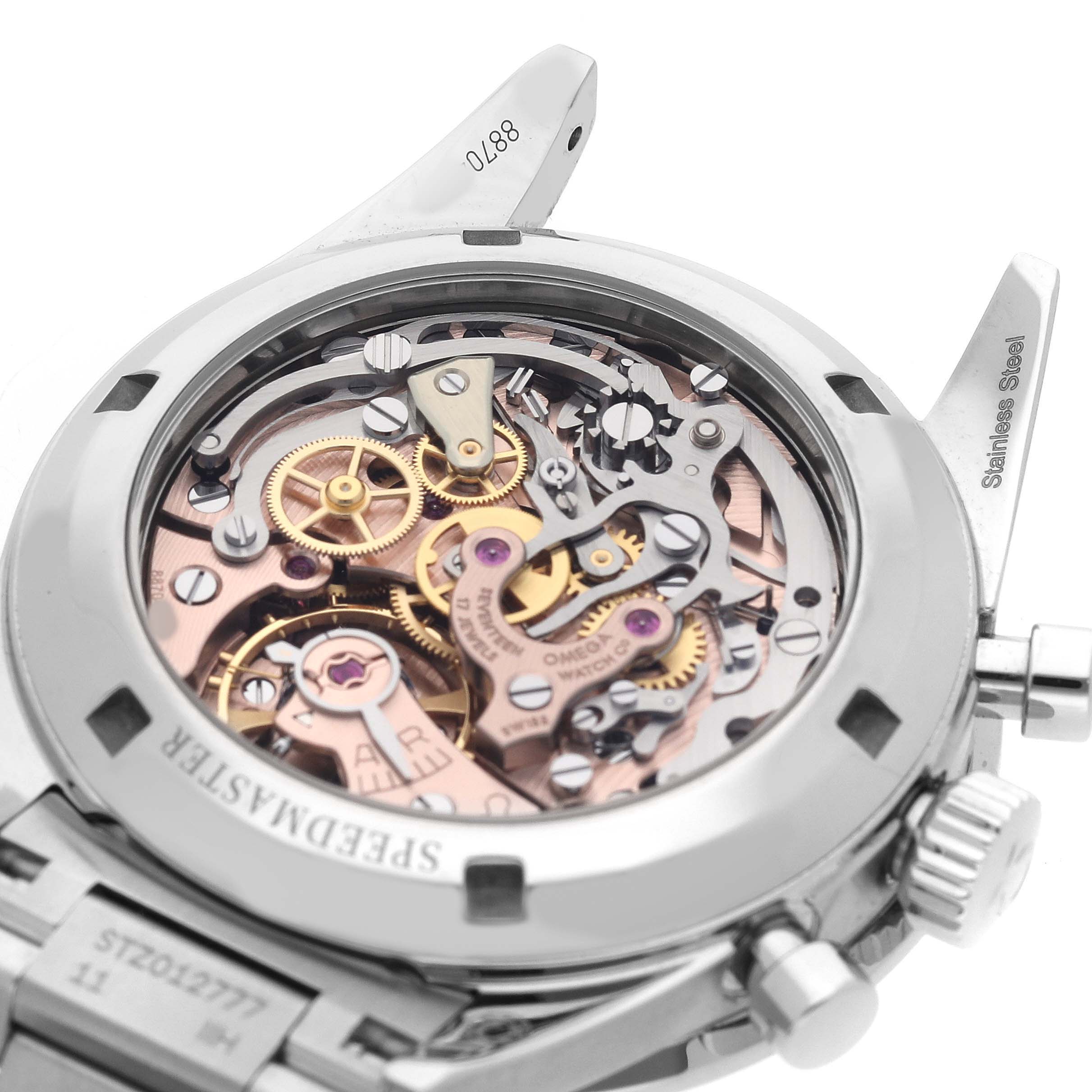 The image shows the Omega Speedmaster 311.30.40.30.01.001 Men's Stainless Steel Black Dial watch from the back, highlighting the intricate mechanical movement and gears.