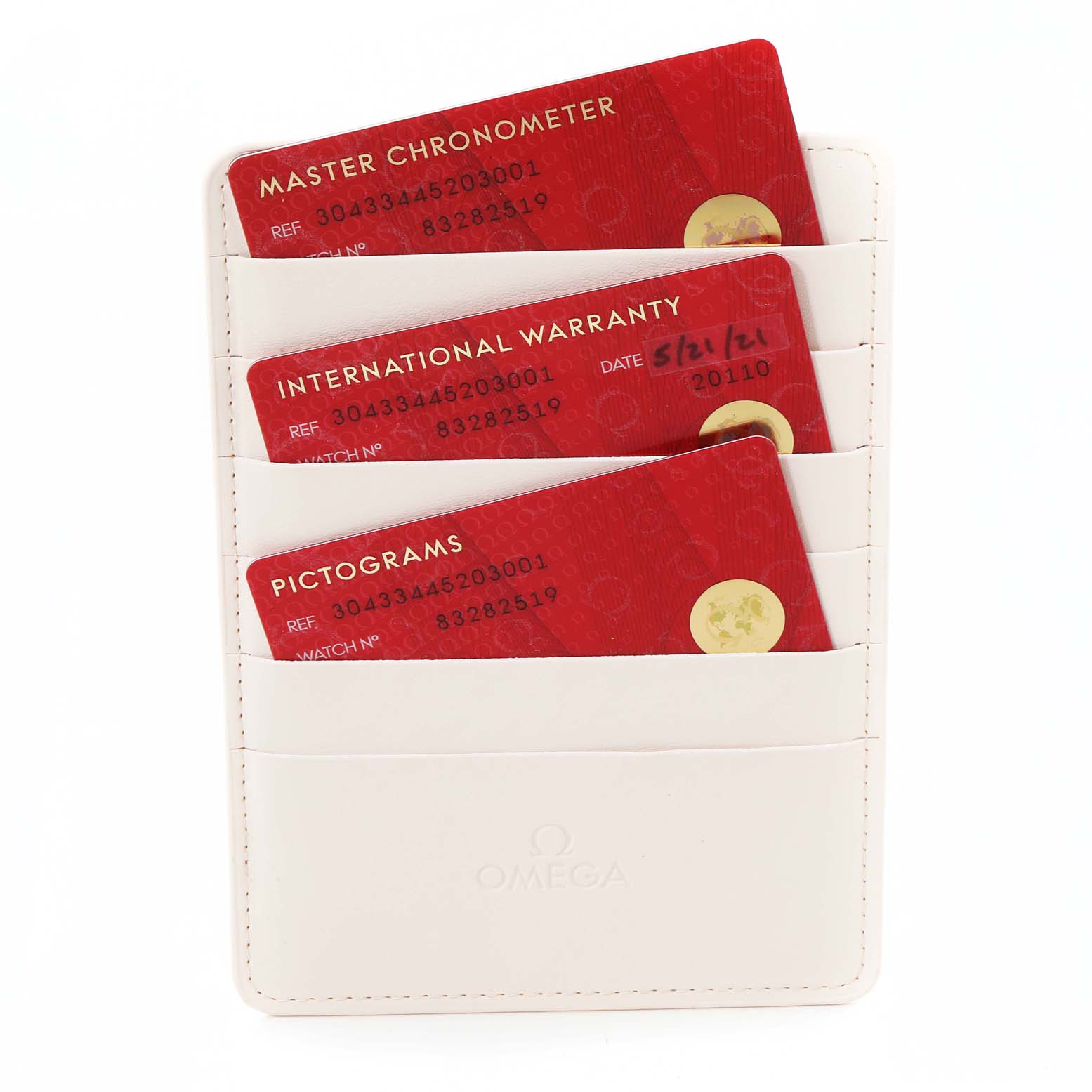 This is an image of warranty and information cards for an Omega Speedmaster 304.33.44.52.03.001 Men's Stainless Steel Blue Dial 304.33.44.52.03.001 Men's Stainless Steel Blue Dial, shown in a white cardholder.