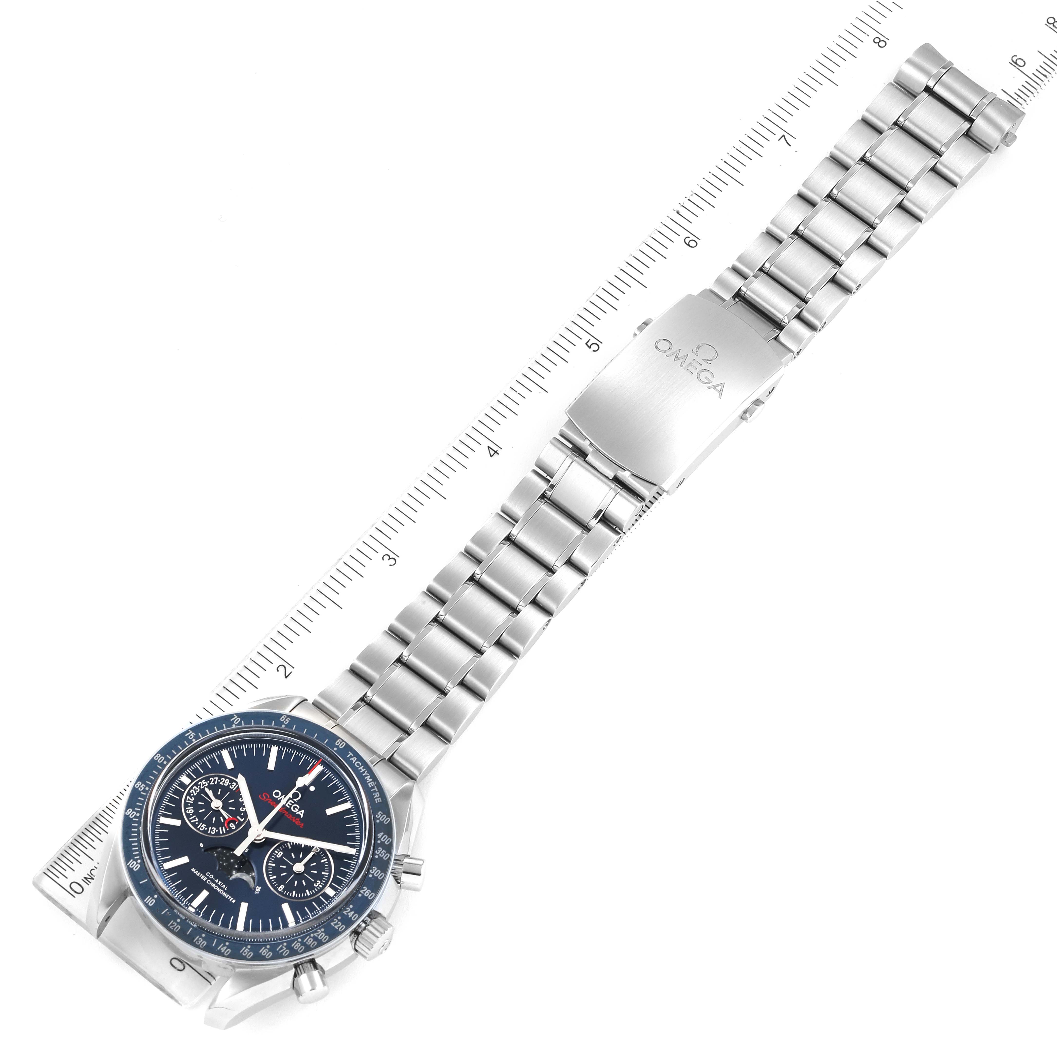 The image shows an Omega Speedmaster 304.33.44.52.03.001 Men's Stainless Steel Blue Dial 304.33.44.52.03.001 Men's Stainless Steel Blue Dial watch at an oblique angle, highlighting the face, bezel, and metal bracelet with the clasp.