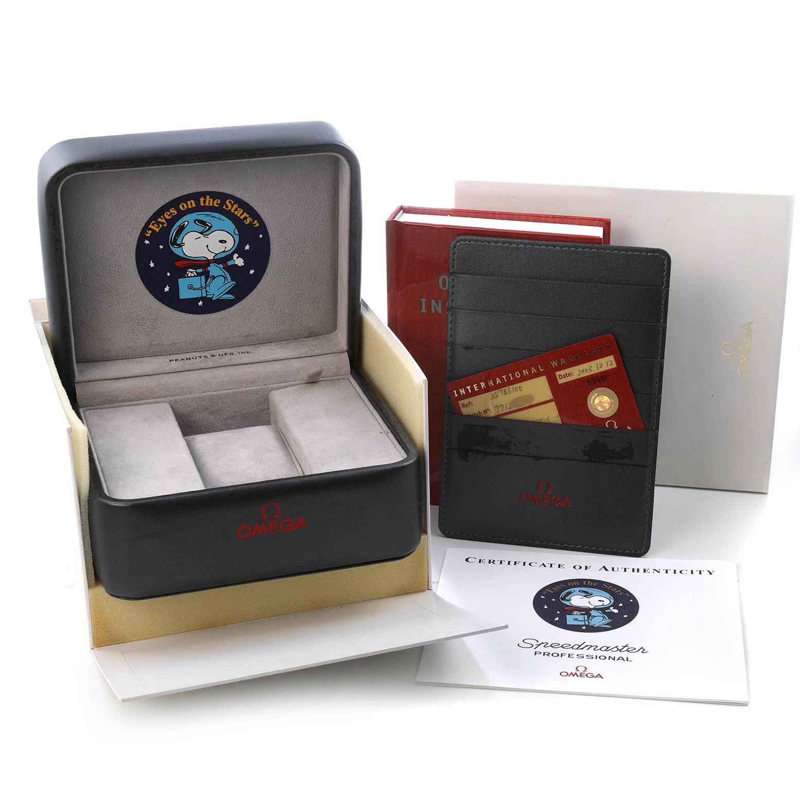 The image shows an Omega Speedmaster 3578.51.00 Men's Stainless Steel Black Dial watch box open, with a Snoopy logo inside, alongside manuals and a certificate.