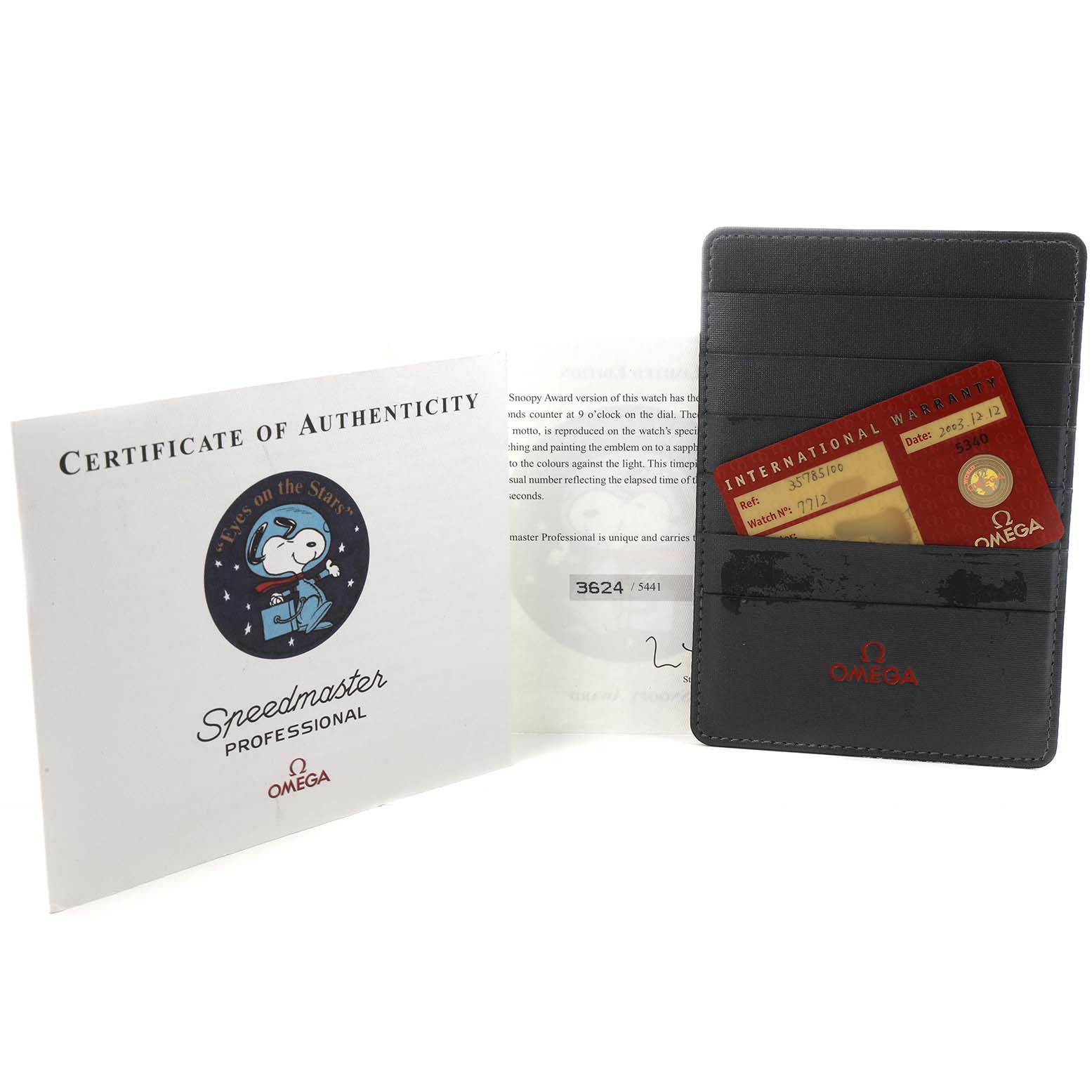 The image shows Omega Speedmaster 3578.51.00 Men's Stainless Steel Black Dial accessories: a Certificate of Authenticity, a wallet, and an international warranty card.