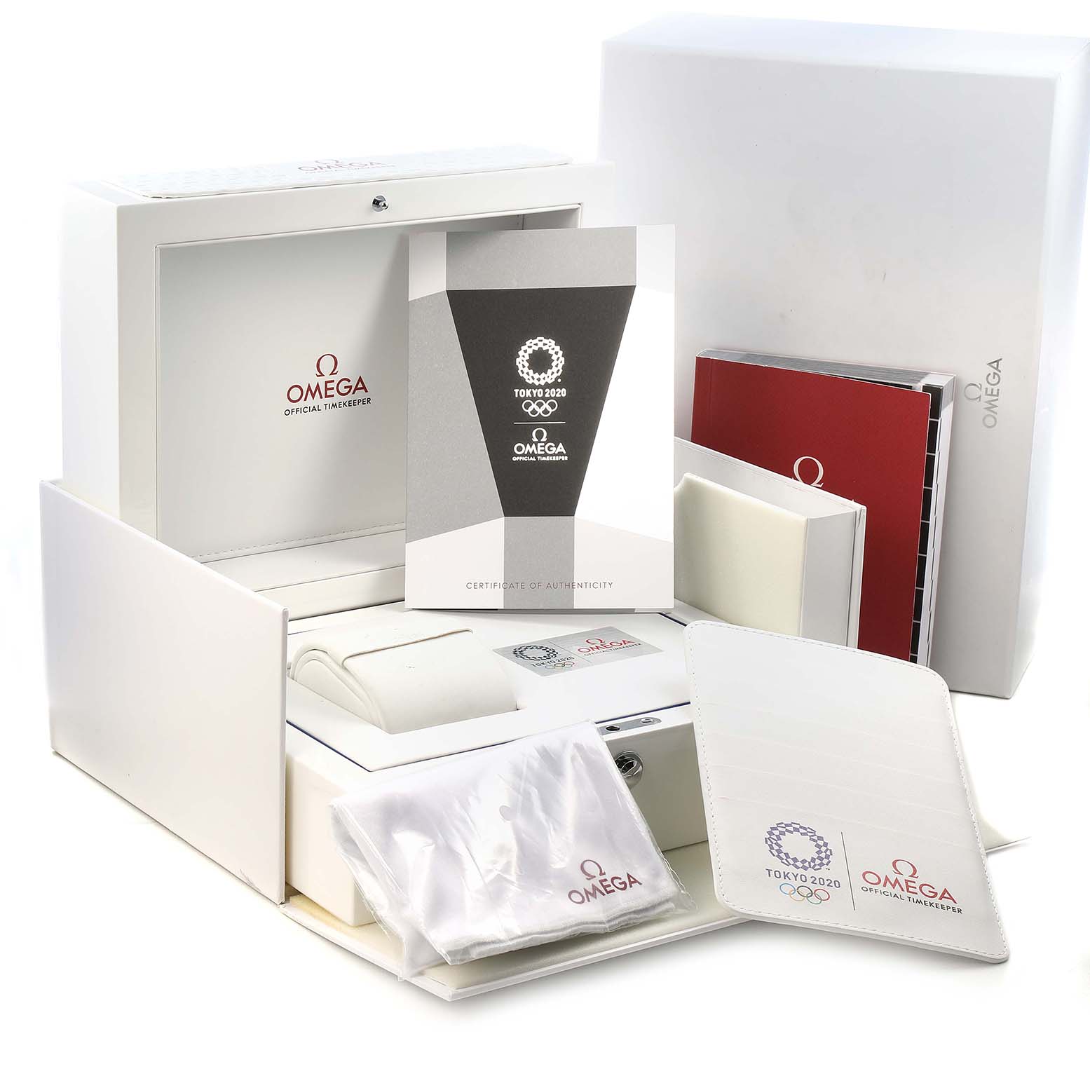 The image shows the packaging and accessories for an Omega Speedmaster 522.30.42.30.04.001 Men's Stainless Steel White Dial, including the certificate, boxes, and cleaning cloth.