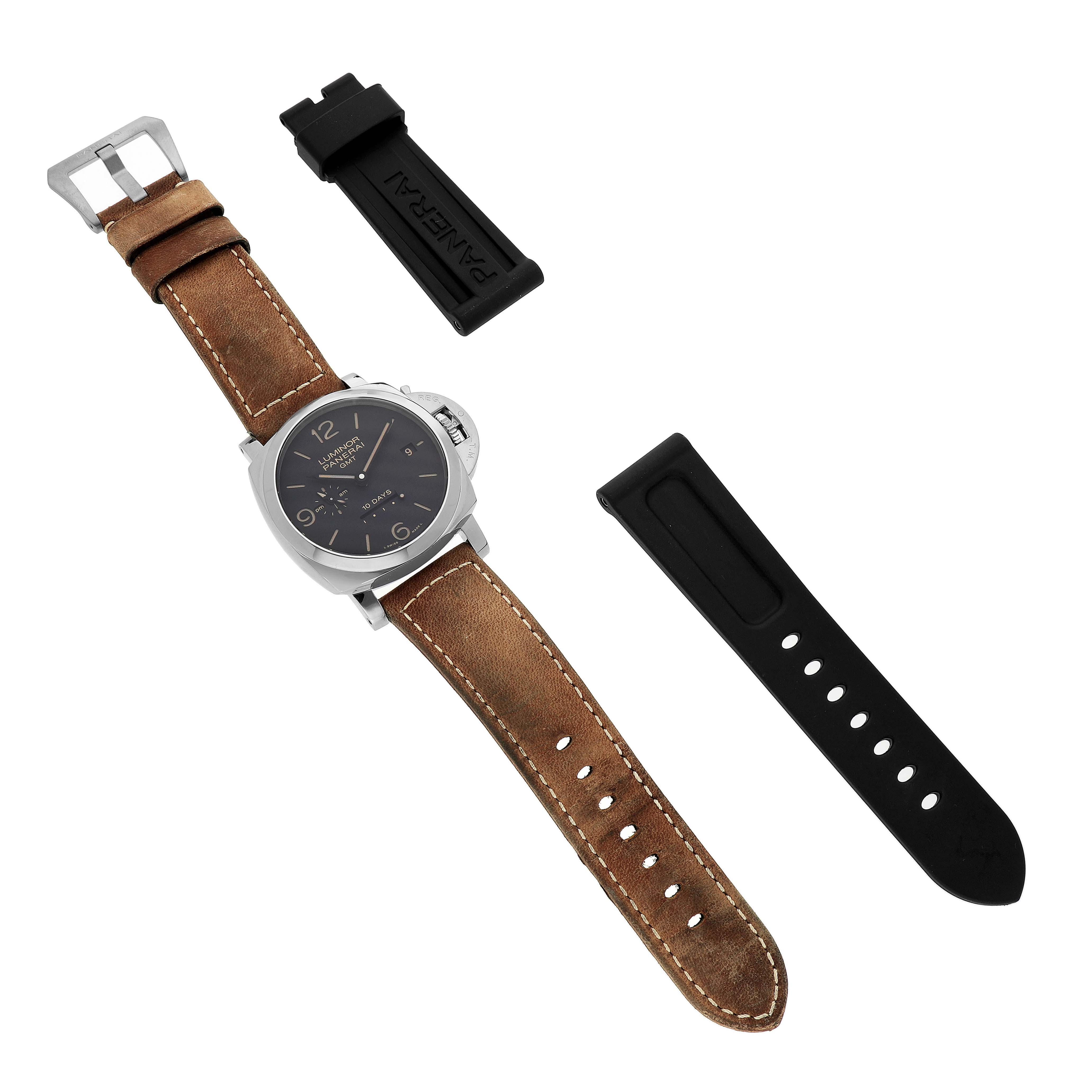 The image shows a Panerai Luminor PAM00533 Men's Stainless Steel Black Dial watch with a brown leather strap, and two black rubber strap pieces, viewed from above.