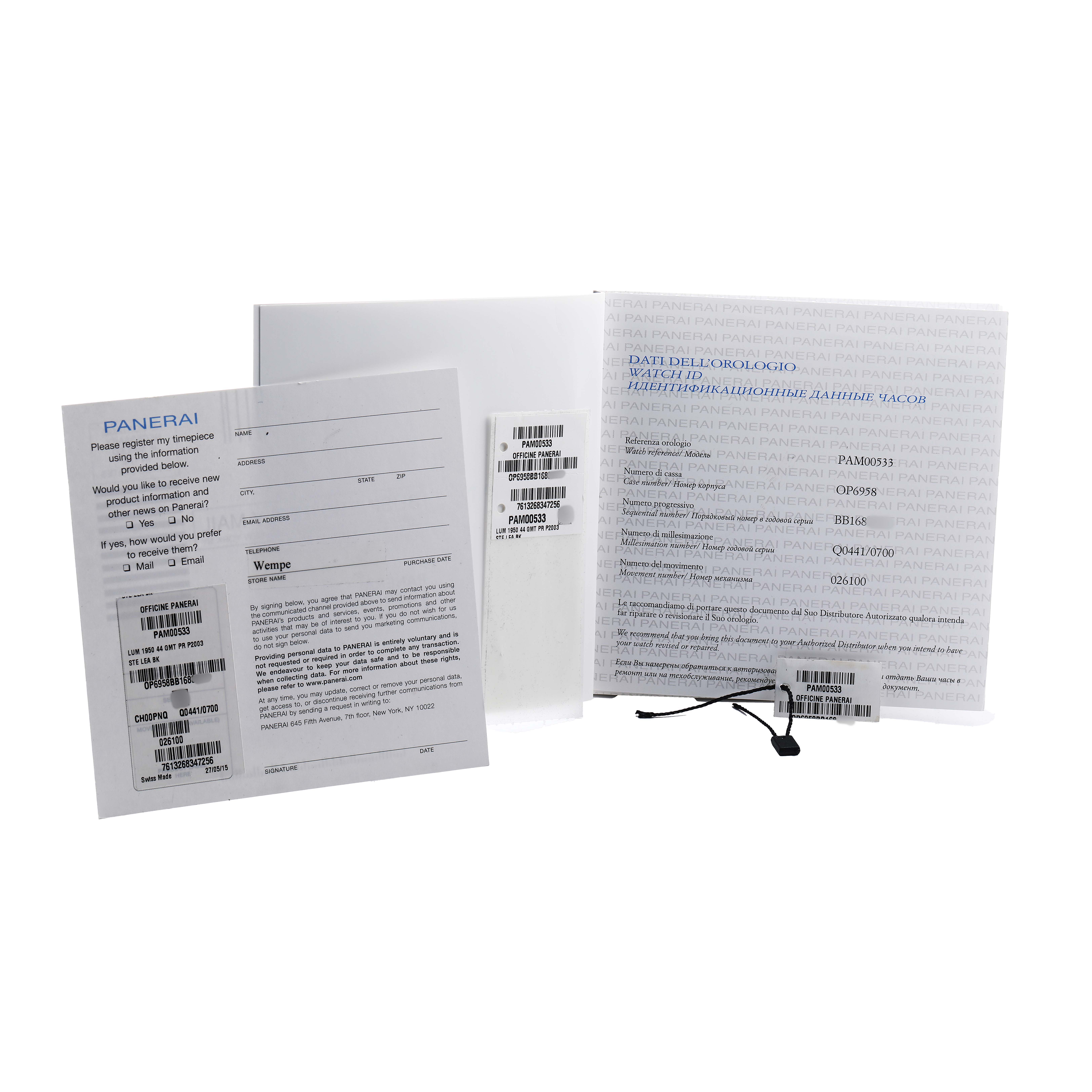 The image shows warranty cards and documentation for a Panerai Luminor PAM00533 Men's Stainless Steel Black Dial watch, viewed from the front.