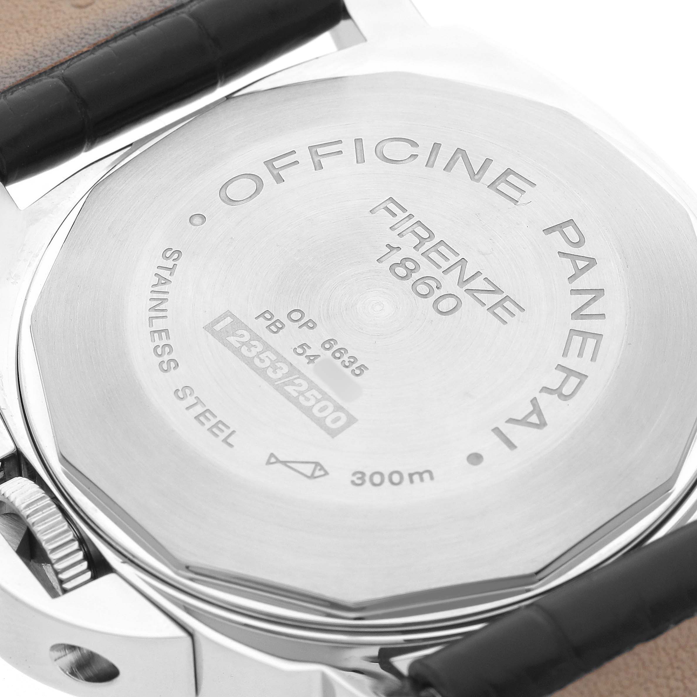 The image shows the back of the Panerai Luminor PAM00090 Men's Stainless Steel Black Dial watch, highlighting its engravings and stainless steel construction.