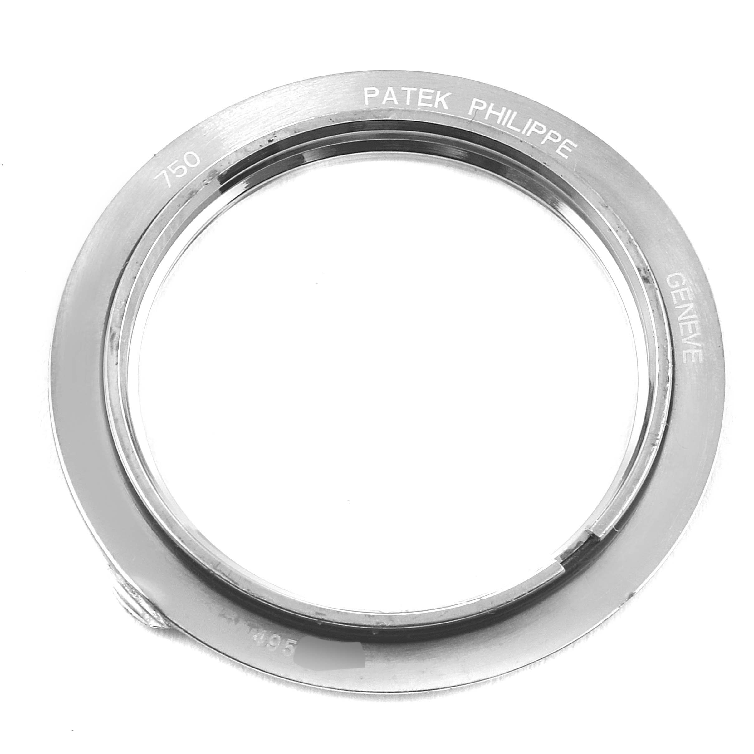 This image shows a close-up of the watch bezel for a Patek Philippe Calatrava 5119G Men
s White Gold White Dial 5119G Men
s White Gold White Dial model.