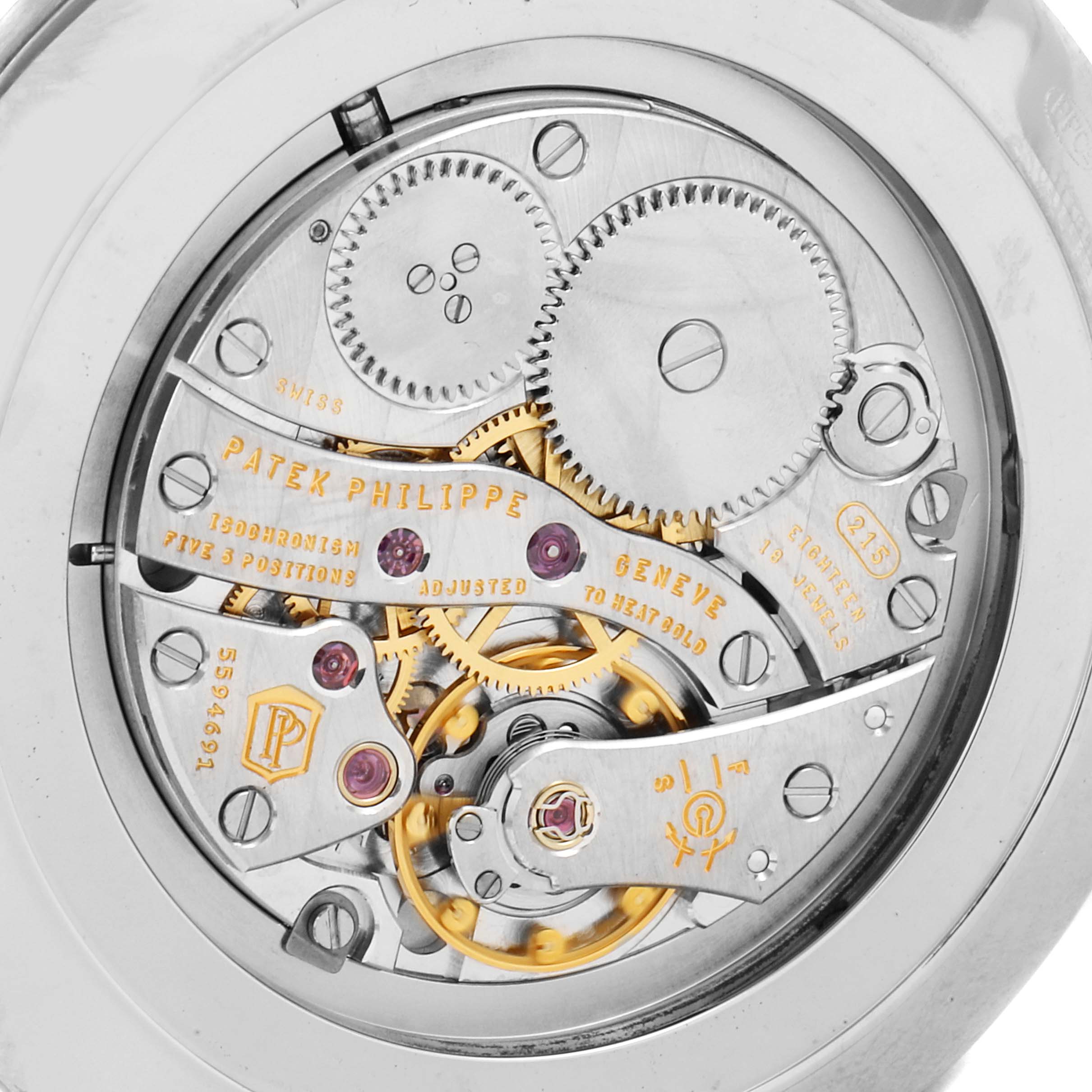 This image shows the intricate back view of the Calatrava model by Patek Philippe, highlighting its internal mechanical components.