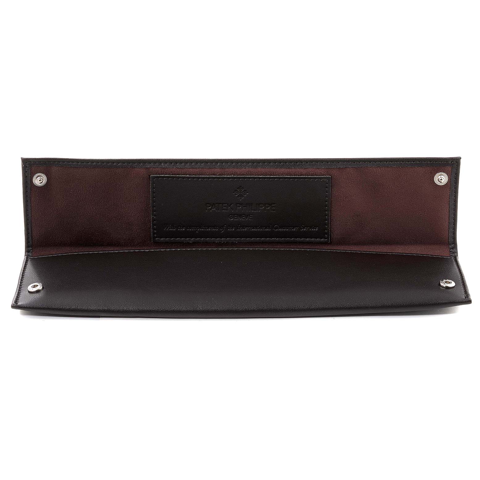 This image shows an open leather pouch for the Patek Philippe Calatrava 3919 Men's Yellow Gold White Dial 3919 Men's Yellow Gold White Dial watch, displaying the brand's embossed logo inside.