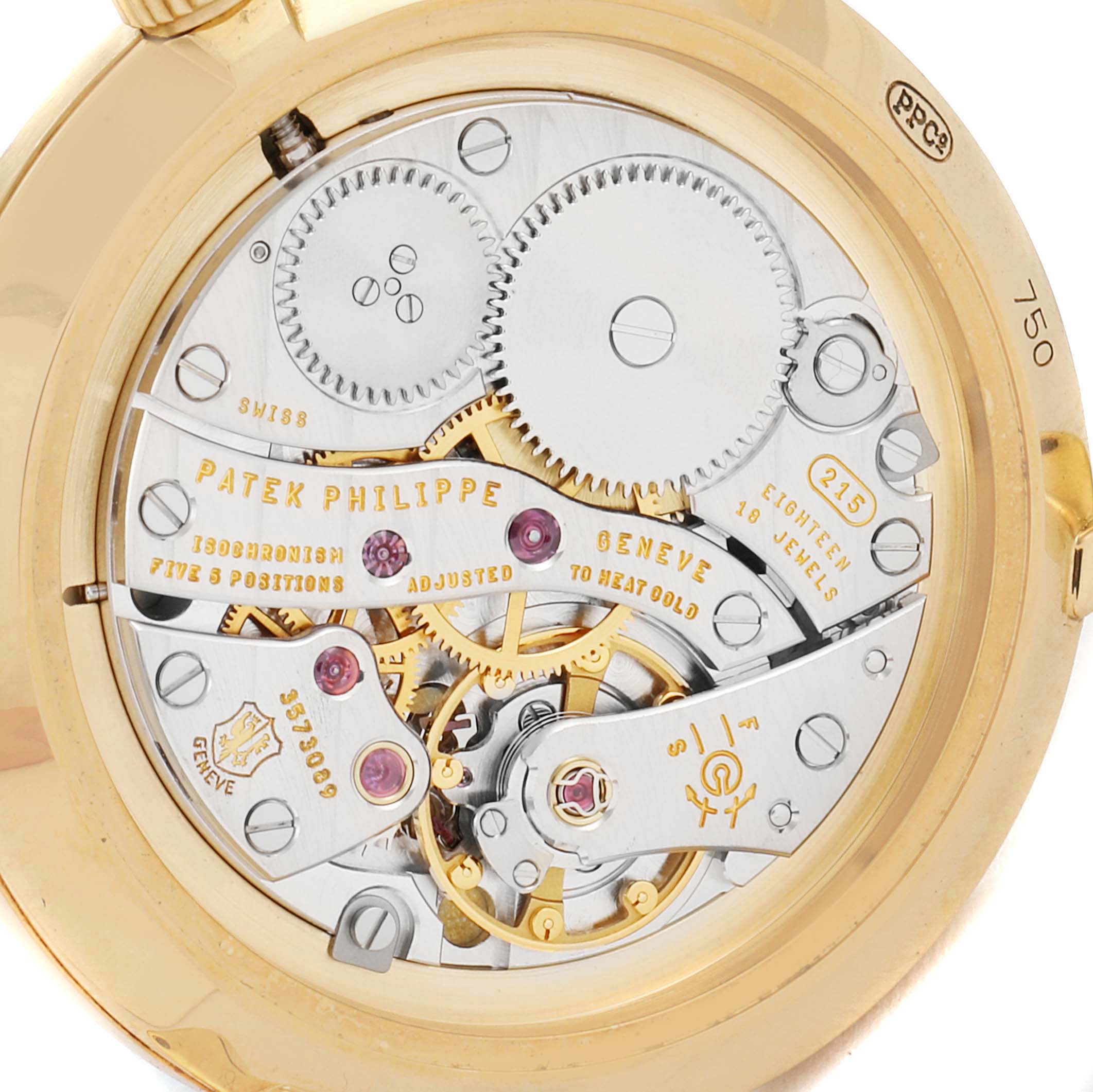 The image shows the intricate mechanical movement and gears of a Patek Philippe Calatrava 7119J Women's Yellow Gold White Dial 7119J Women's Yellow Gold White Dial watch, viewed from the back case.