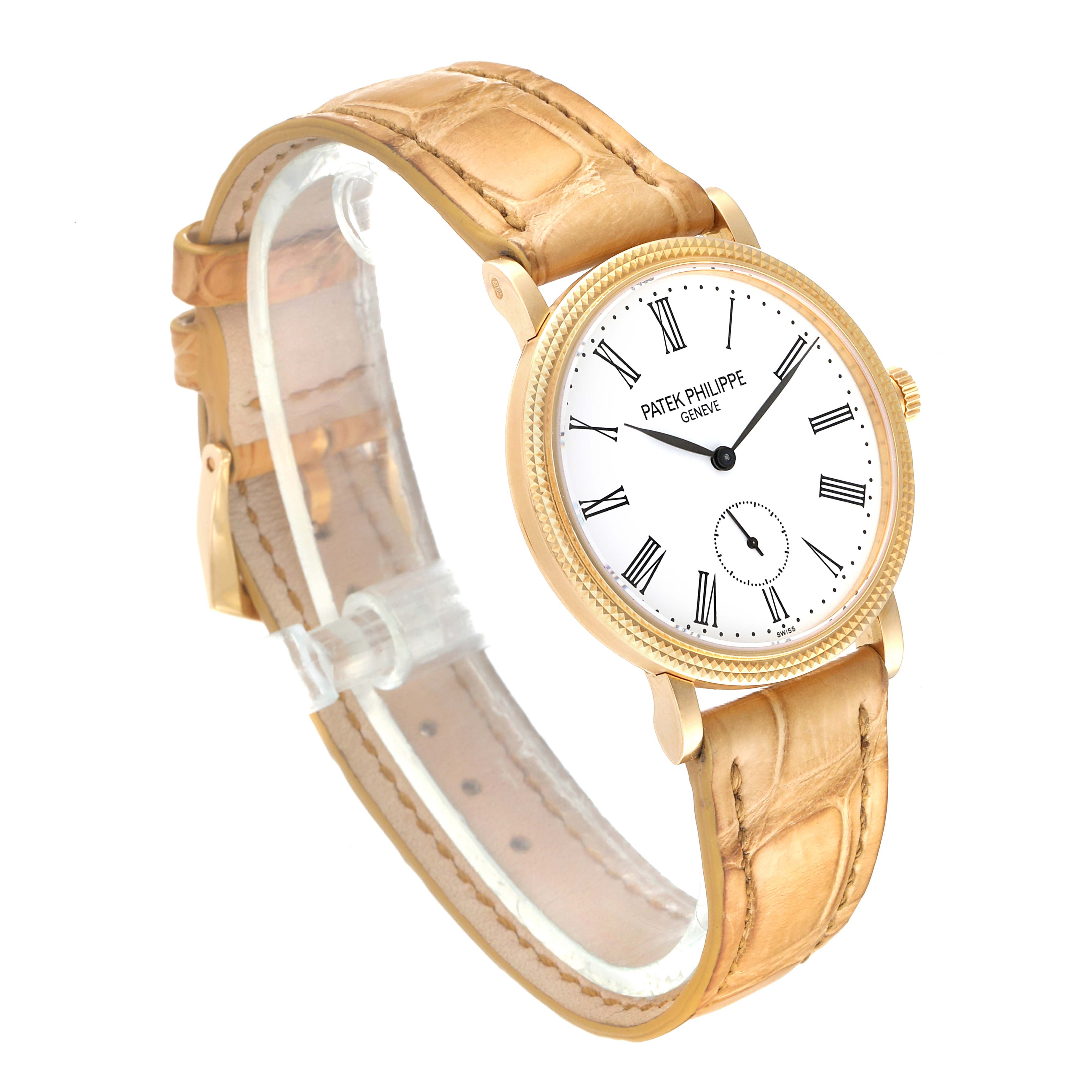 The image shows a side view of a Patek Philippe Calatrava 7119J Women's Yellow Gold White Dial 7119J Women's Yellow Gold White Dial watch, featuring its face, leather strap, and buckle.