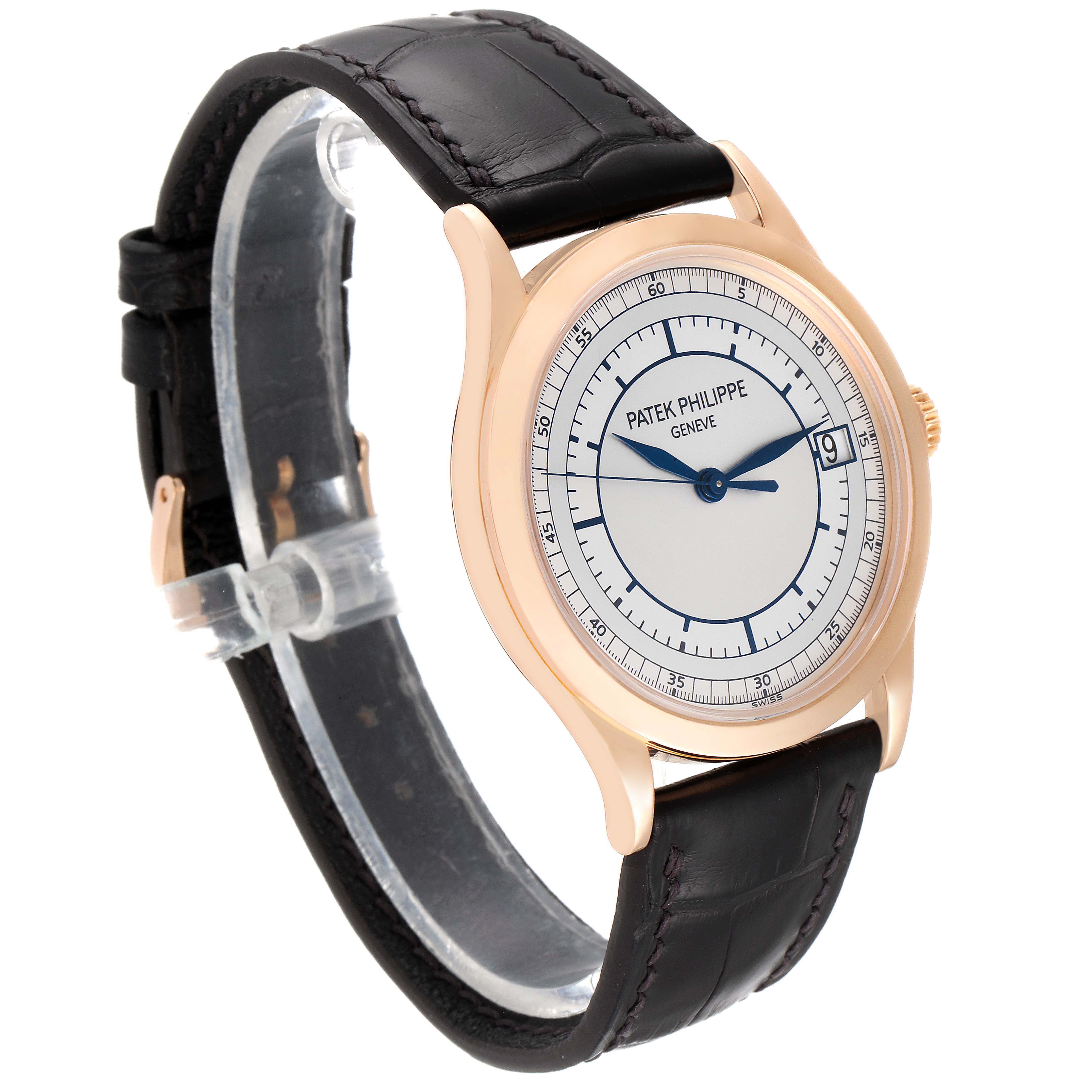 The image shows a Patek Philippe Calatrava 5296R-001 Men
s Rose Gold Silver Dial 5296R-001 Men
s Rose Gold Silver Dial watch at a three-quarter angle, highlighting its dial, bezel, and leather strap.