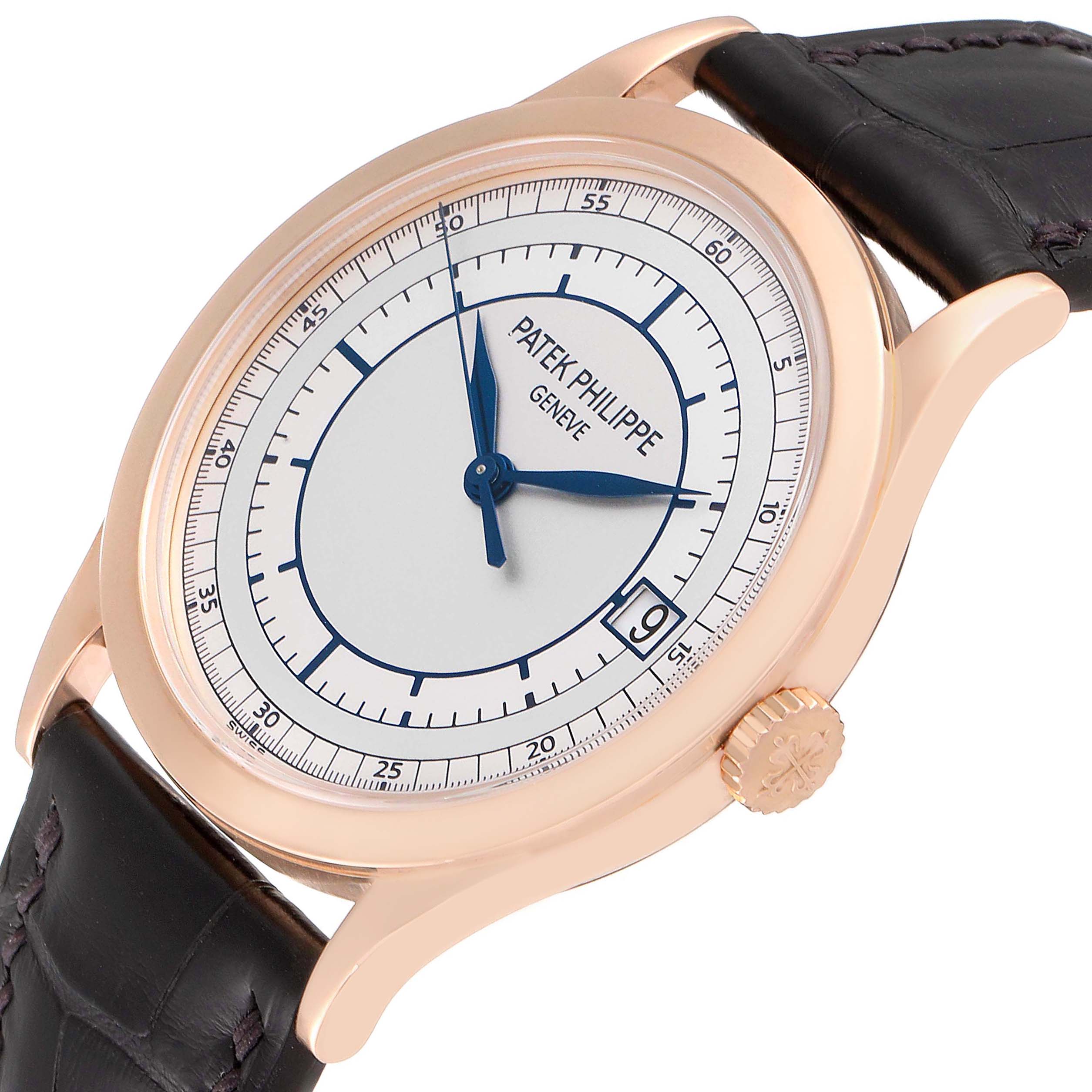 This image shows a close-up of a Patek Philippe Calatrava 5296R-001 Men
s Rose Gold Silver Dial 5296R-001 Men
s Rose Gold Silver Dial watch featuring its dial, crown, and leather strap at an angled view.