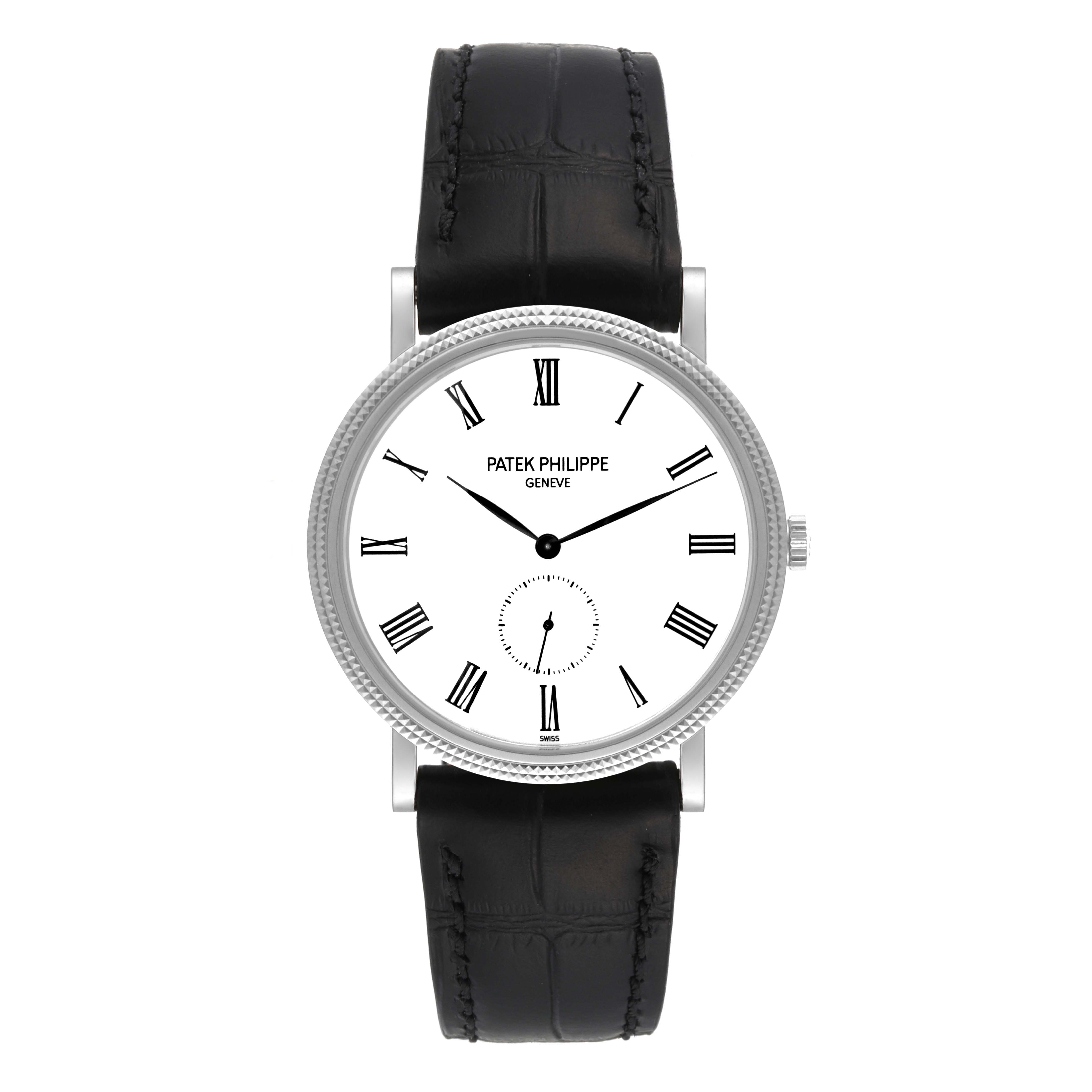 The image shows a front view of a Patek Philippe Calatrava 5119G Men
s White Gold White Dial 5119G Men
s White Gold White Dial watch with a white dial, Roman numerals, and a black leather strap.